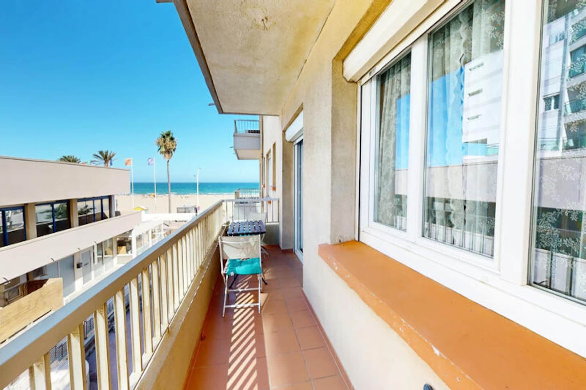 Imagine waking up to the gentle sound of waves and the warm Mediterranean breeze flowing through your balcony. This charming one-bedroom apartment, perfectly situated near Place Méditerranée and just a short stroll from the golden sands of the beach, offers a serene escape on the French coast. Whether you're sipping your morning coffee or enjoying a glass of wine at sunset, the partial sea view from the balcony-terrace sets the tone for a truly relaxing holiday.  
                     Inside, the apartment is designed for comfort and convenience. The bright living room invites you to unwind, while the fully equipped open-plan kitchen, complete with a Senseo coffee machine, makes preparing meals a pleasure. The cozy bedroom promises restful nights, and the air conditioning ensures a cool retreat after a day in the sun. The modern bathroom adds to the ease of your stay, making this property ideal for couples or small families seeking a Mediterranean getaway.  
                     Beyond the apartment, you'll find yourself surrounded by the vibrant charm of the French Riviera. Explore the nearby shops, indulge in fresh seafood at local restaurants, or simply bask in the sun on the pristine beach. With Place Méditerranée just steps away, you'll have access to lively cultural events and entertainment that bring the area to life.  
                     Whether you're here to relax by the sea, discover the coastal beauty, or immerse yourself in the local culture, this apartment offers the perfect base for an unforgettable holiday experience.