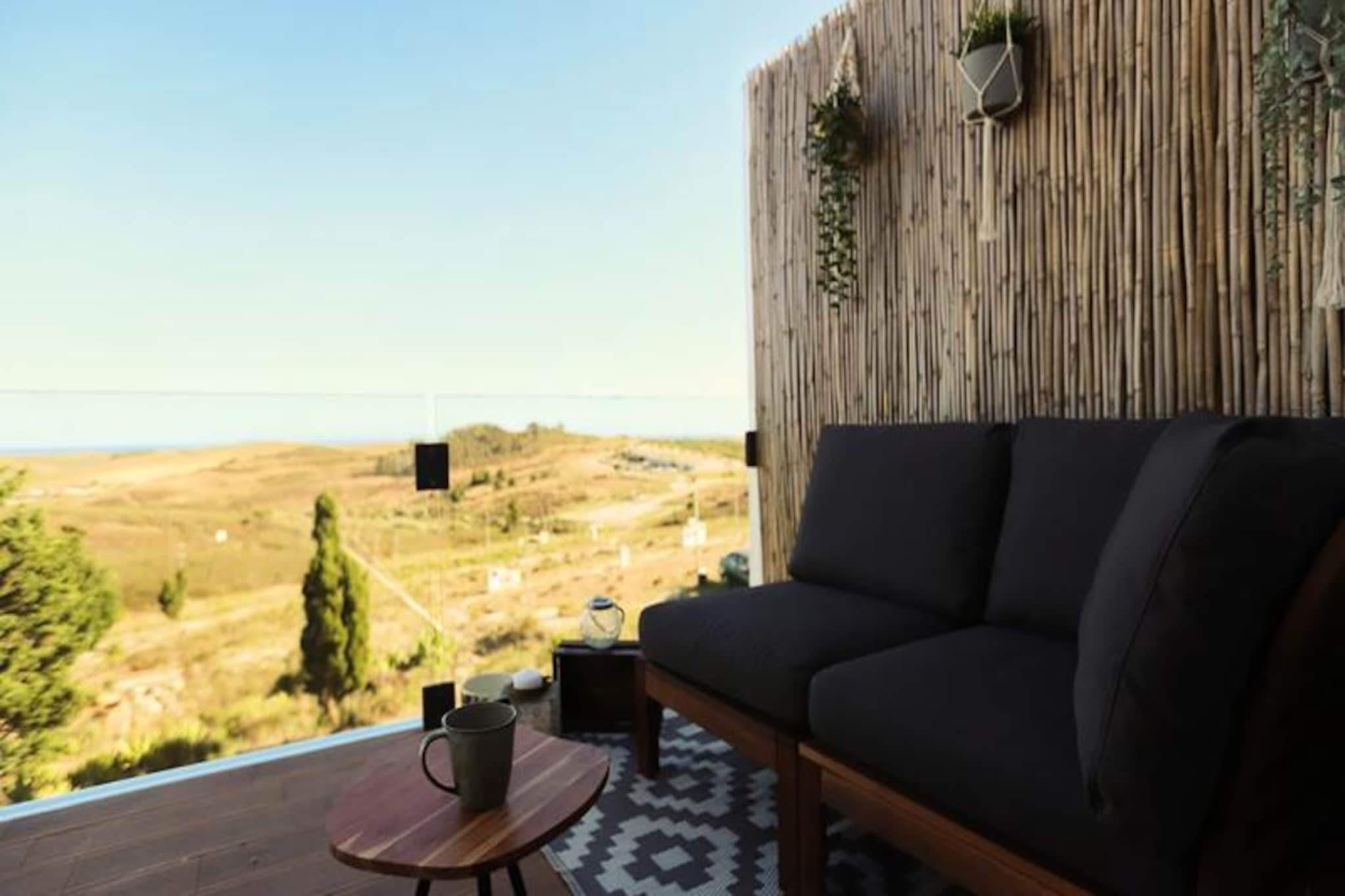 Perched in the serene community of Altos de Raposeira, this modern two-story home offers a tranquil escape with breathtaking ocean views. Whether you’re seeking a peaceful retreat or a base to explore the Algarve’s vibrant offerings, this property is the perfect choice for families, couples, or small groups. Surrounded by nature yet conveniently close to charming towns and stunning beaches, it’s a haven for relaxation and adventure alike.
Step inside to discover a warmly decorated space featuring two comfortable bedrooms, two bathrooms, and an additional guest toilet. The living room, complete with a sofa bed, invites you to unwind, while the fully equipped kitchen caters to all your culinary needs. Outside, a private garden and balconies provide the ideal setting to soak in the Algarve’s beauty. Modern amenities such as Wi-Fi, television, and baby-friendly facilities ensure a worry-free stay for all guests.
Located just a short drive from 16 pristine beaches, this home places you at the heart of the Algarve’s natural splendor. Explore the surf town of Sagres, only 10 minutes away, or venture to Lagos with its vibrant atmosphere and golden sands. Local supermarkets, authentic Portuguese restaurants, and hiking trails are all within easy reach, making it an ideal spot for both relaxation and exploration.
Whether you’re a surfer chasing waves, a family seeking tranquility, or a foodie eager to savor Algarve’s culinary delights, this property promises an unforgettable stay. With Faro Airport just 75 minutes away, your dream holiday in Portugal begins here.