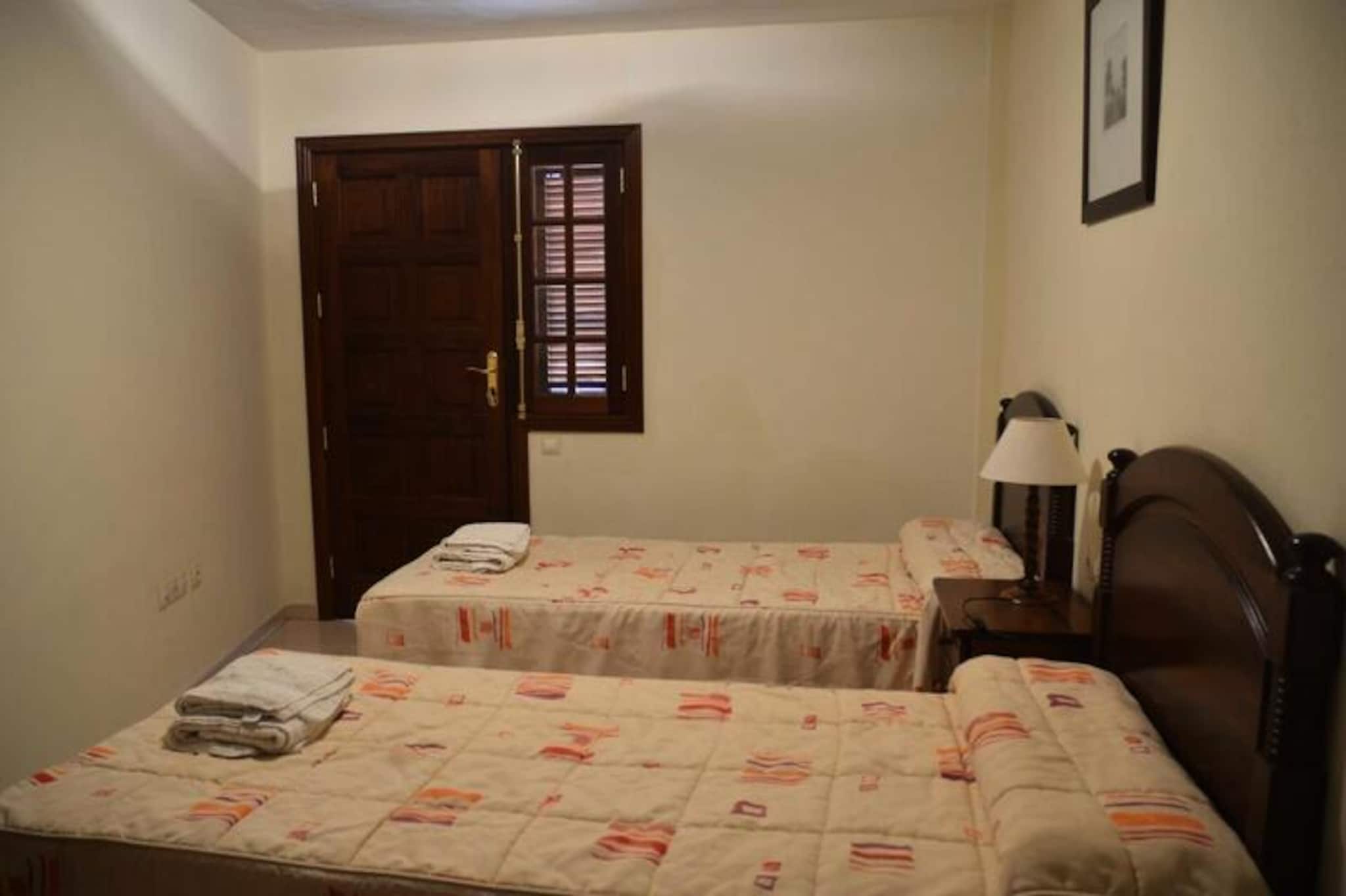 On the sun-drenched island of La Gomera, this charming apartment in Valle Gran Rey offers a serene escape surrounded by breathtaking natural beauty. With its tranquil ambiance and stunning vistas, this property invites you to unwind and soak in the unique charm of the Canary Islands. Whether you’re seeking a peaceful retreat or an adventure-filled getaway, this apartment is the perfect base for your holiday. \n\nSpanning 93 square meters, the apartment comfortably accommodates up to four guests across two cozy bedrooms. The open-plan kitchen, equipped with a ceramic hob, refrigerator, freezer, coffee maker, toaster, and kettle, makes preparing meals a breeze. Relax in the living area with satellite TV and Wi-Fi, or step out onto the balcony to enjoy the fresh ocean breeze and views of the surrounding landscape. Every detail has been thoughtfully designed to ensure a comfortable and enjoyable stay. \n\nValle Gran Rey is a haven for nature lovers and outdoor enthusiasts. Explore the nearby Garajonay National Park, a UNESCO World Heritage Site, with its lush laurel forests and scenic hiking trails. The pristine beaches of Valle Gran Rey, such as Playa de Vueltas and Playa del Inglés, are just a short distance away, offering crystal-clear waters and golden sands. You’ll also find charming local restaurants, shops, and cafes where you can savor traditional Canarian cuisine and hospitality. \n\nWhether you’re strolling along the coastline, hiking through verdant trails, or simply relaxing on your balcony with a view, this apartment provides the perfect setting for creating unforgettable memories on La Gomera.