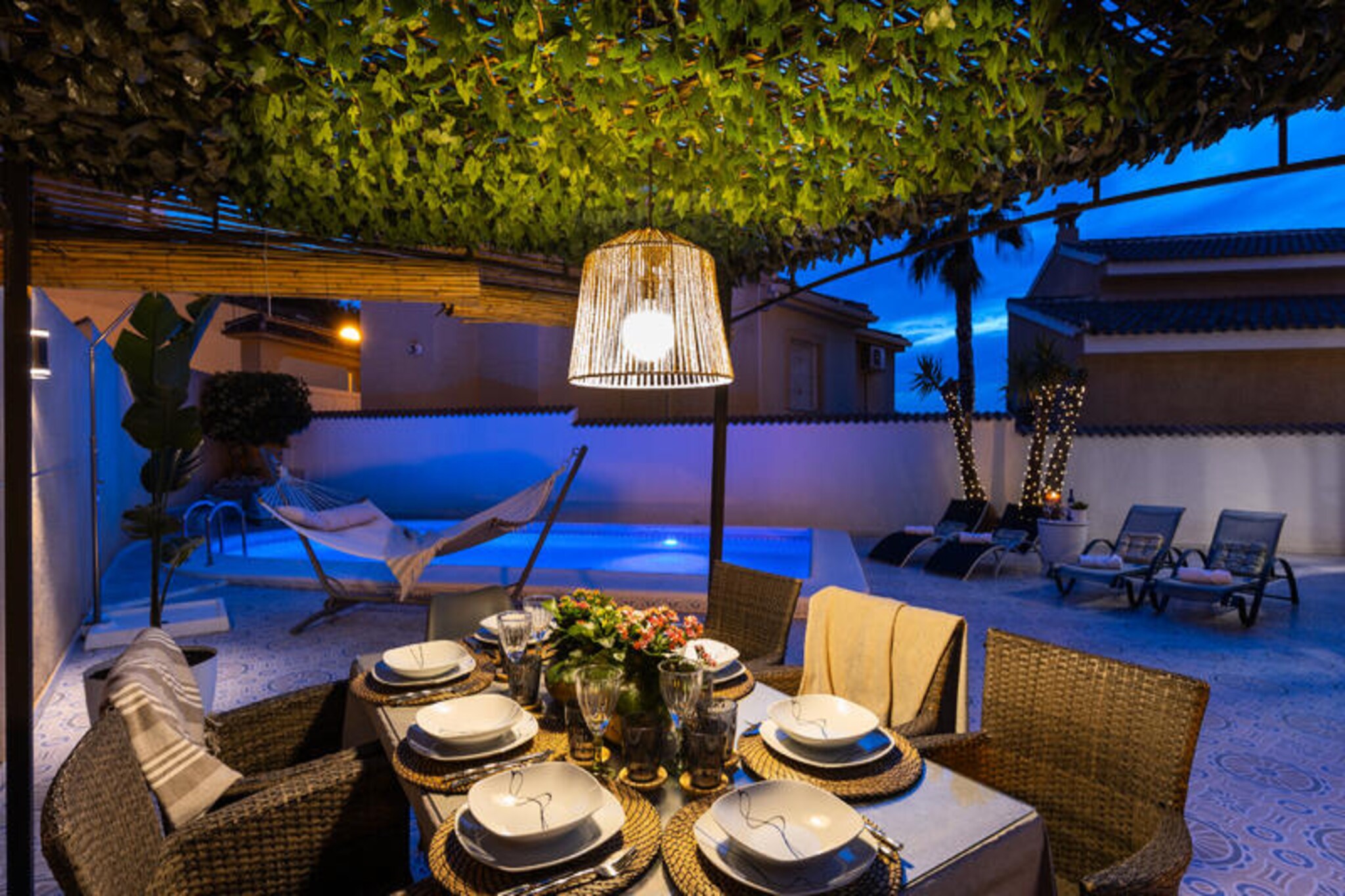 In the heart of Spain’s sun-drenched Costa Blanca, this beautifully renovated villa offers the perfect escape for families and friends seeking relaxation and leisure. Situated next to the prestigious Ciudad Quesada La Marquesa golf course, it’s a haven for golf enthusiasts and those looking to unwind in a serene yet vibrant setting. With its blend of modern elegance and warm Mediterranean charm, this villa invites you to create unforgettable memories. 

Step inside to discover a spacious and luminous living room, where a cozy fireplace adds a touch of warmth and intimacy. The villa comfortably accommodates up to 10 guests with two stylishly designed bedrooms, three versatile living areas, and a ground-floor bathroom. The living room features two sofa beds, perfect for larger groups, while the additional spaces include a game room, a TV lounge, and a sleeping area with two beds. The fully equipped kitchen is ideal for preparing delicious meals, which can be savored in the indoor dining area or al fresco in the barbecue zone. 

Outside, the private pool and sunny terrace beckon for lazy afternoons under the Spanish sun. Whether you’re swimming, lounging, or enjoying a meal by the poolside, the outdoor spaces are designed for pure relaxation. The covered games room, complete with a pool table and other activities, ensures entertainment for all ages. On-site parking for multiple vehicles adds convenience, while nearby restaurants and supermarkets make it easy to enjoy local flavors and stock up on essentials. 

This villa is more than just a place to stay; it’s a retreat where tranquility meets modern comfort. Whether you’re here for the golf, the sunshine, or quality time with loved ones, this property promises an unforgettable holiday experience.