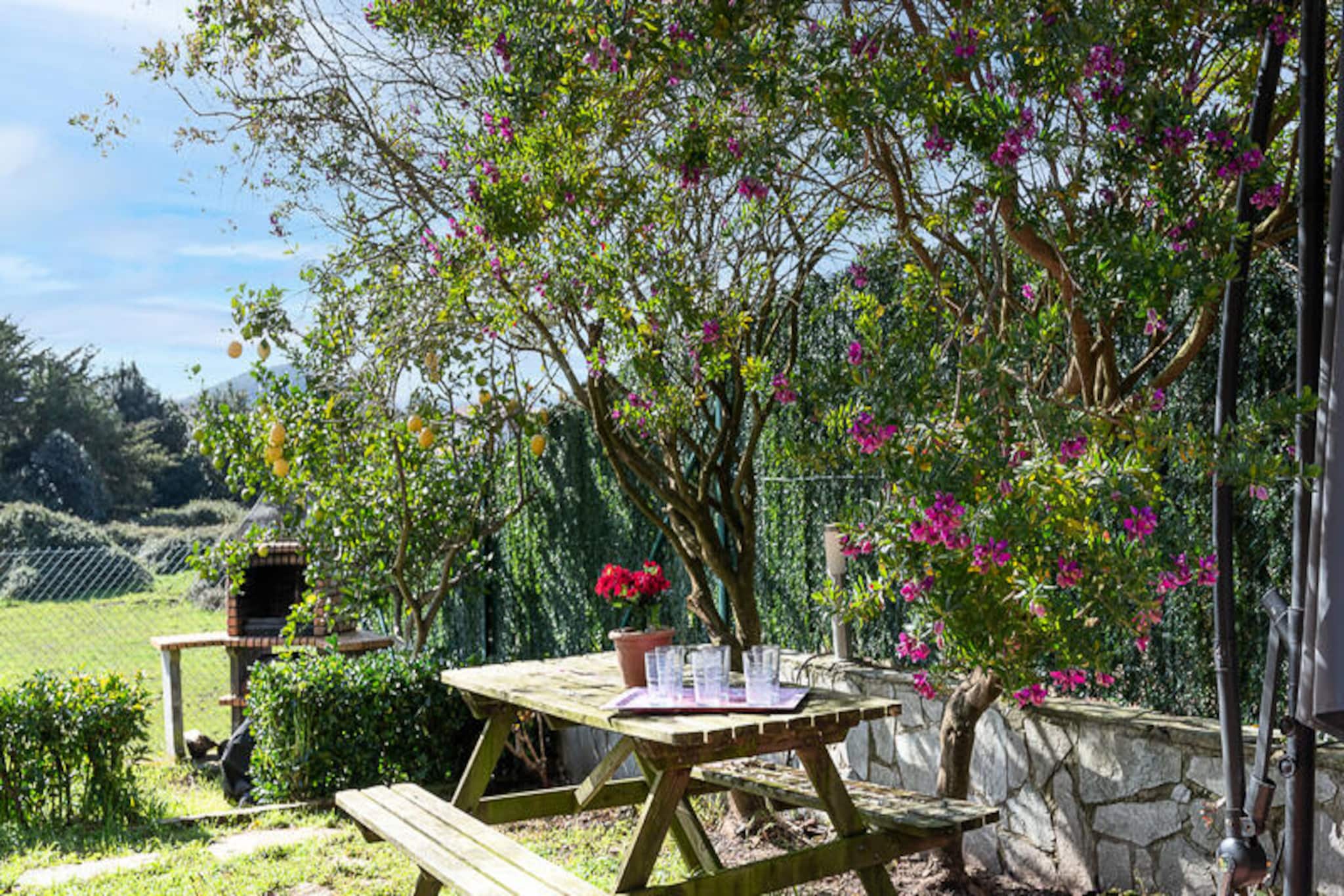 In the heart of a picturesque coastal village in Cantabria, this delightful house invites you to experience the perfect blend of comfort and natural beauty. With its thoughtfully designed outdoor spaces and proximity to some of the region's most stunning beaches, it’s an ideal retreat for families, friends, or surf enthusiasts seeking a memorable getaway. Just a short drive away, you’ll find the golden sands of Berria and Trengandán beaches, the tranquil Santoña Marshes Natural Park, and the vibrant village of Santoña, known for its rich culinary traditions and lively atmosphere.
The house offers a spacious and bright layout, starting with a welcoming ground floor that features a cozy living room, a generous dining area, and a fully equipped kitchen that opens onto a sunny terrace. A full bathroom completes this level. Upstairs, three inviting double bedrooms await, along with another full bathroom. The master bedroom includes a convenient pull-out bed, perfect for accommodating additional guests.
Step outside to discover a terrace designed for relaxation and enjoyment. With a barbecue area, multiple dining spaces, and versatile outdoor furniture, it’s the perfect setting for al fresco meals or unwinding after a day of exploring. Surf enthusiasts will appreciate the dedicated outdoor area for storing surfboards, as well as the proximity to surf schools and prime surfing spots.
Whether you’re here to explore the natural wonders of Cantabria, indulge in local gastronomy, or simply relax by the sea, this charming house offers everything you need for an unforgettable stay. Let the fresh coastal air and serene surroundings inspire your next adventure.