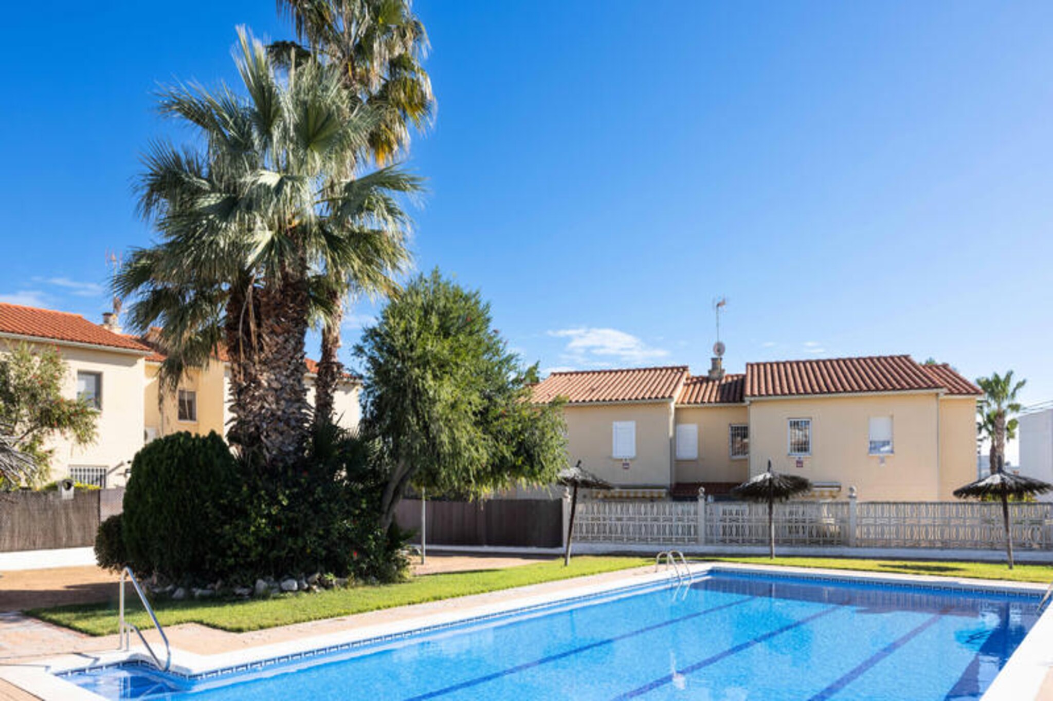 In the serene coastal town of Creixell, this delightful holiday home invites you to experience the true charm of the Mediterranean. Just a short 10-minute stroll from golden sandy beaches, this property is a haven for those seeking relaxation and seaside adventures. Surrounded by the tranquil ambiance of a quiet neighborhood, it’s the perfect retreat to unwind and create cherished memories with loved ones. Here, the gentle sea breeze and warm Spanish sun set the tone for an unforgettable getaway.
The home boasts three spacious terraces, each offering a unique space to soak up the sun, enjoy al fresco dining, or simply relax with a good book. A barbecue area provides the perfect setting for lively evenings filled with delicious meals and laughter. Guests can also take advantage of the communal swimming pool, a refreshing escape on warm summer days. Inside, the home is thoughtfully designed with comfort and convenience in mind, making it an ideal choice for families or groups of friends.
Creixell’s prime location offers easy access to the region’s highlights. Explore the stunning Costa Dorada coastline, visit nearby Tarragona with its rich Roman history, or indulge in local culinary delights at charming seaside restaurants. Whether you’re seeking beachside relaxation, cultural exploration, or simply a peaceful retreat, this home offers it all.
Let the Mediterranean lifestyle captivate you in this welcoming holiday home, where every moment is an opportunity to relax, reconnect, and revel in the beauty of Spain’s sunny shores.