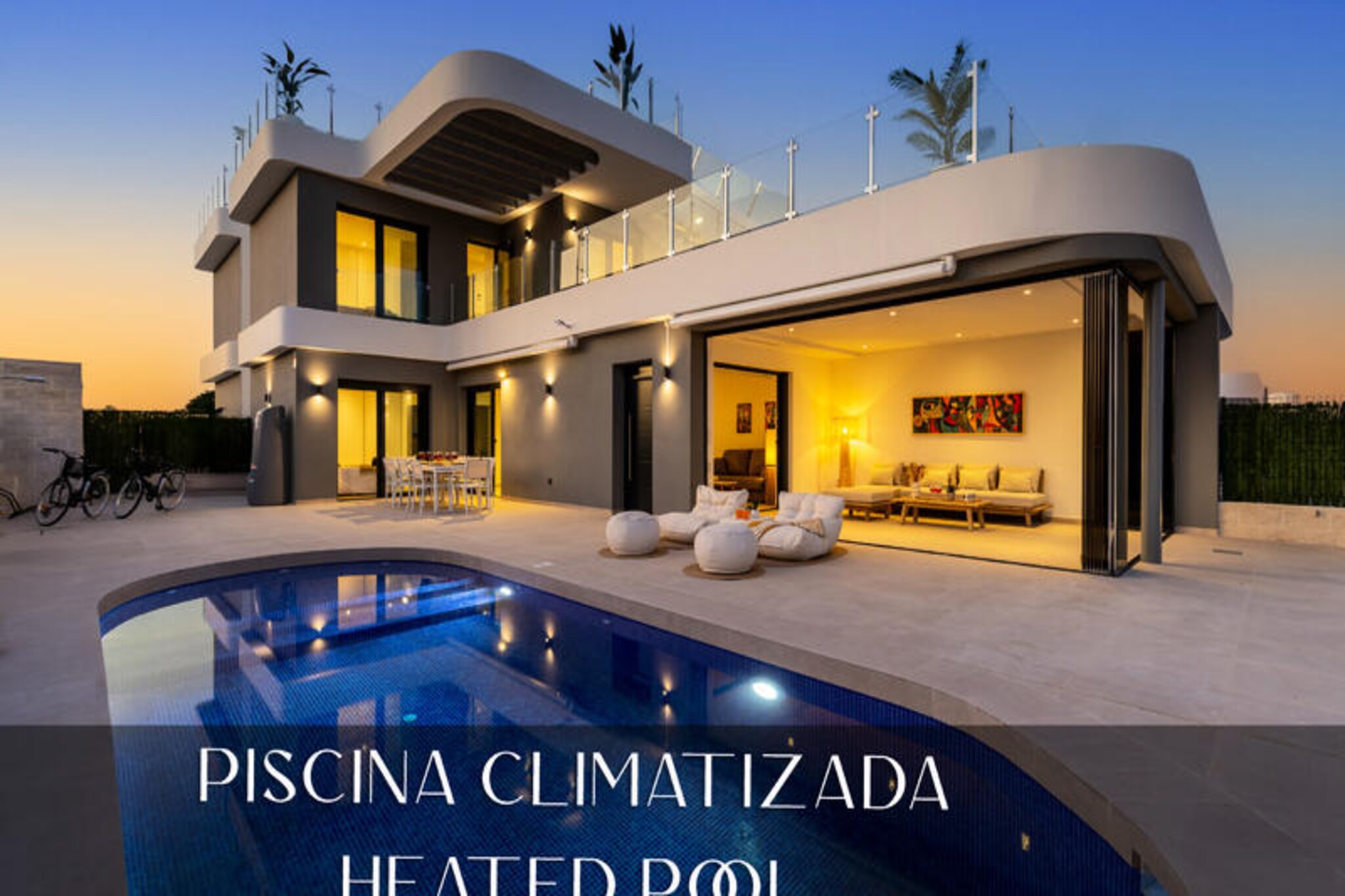 Step into a world of modern elegance at this stunning villa in Los Alcázares, where every detail has been designed to elevate your holiday experience. With its heated outdoor pool available year-round (for stays of 4 nights or more from October), you can indulge in relaxation no matter the season. Two bicycles are at your disposal, inviting you to explore the charming surroundings and nearby coastline. Just a 10-minute stroll brings you to the seafront promenade and its pristine sandy beaches, perfect for sun-soaked days and tranquil evenings by the water.
Inside, the villa offers three spacious bedrooms, each equipped with its own television, ensuring ultimate comfort and privacy. Two modern bathrooms and an additional toilet cater to your convenience, while air conditioning in every room guarantees a pleasant stay throughout the year. The fully equipped kitchen, complete with a dishwasher, washing machine, and dryer, makes meal preparation and daily tasks a breeze. Two inviting living rooms provide ample space for relaxation or entertaining, making it ideal for families or groups of friends.
The outdoor spaces are equally impressive, with three terraces designed for every occasion. Enjoy al fresco dining on the main terrace, soak up the sun on the loungers, or unwind on the first-floor terrace’s sofa area. The crowning jewel is the solarium, offering breathtaking views and a cozy seating area for serene summer evenings. A private parking space and high-quality finishes throughout the property add to the sense of luxury and convenience.
Located just 10 minutes from the city center, this villa combines the tranquility of a residential setting with easy access to local amenities. Whether you’re seeking a peaceful retreat or an active holiday exploring the beautiful Costa Cálida, this villa promises an unforgettable stay. With online check-in and self-service options, your arrival is seamless, leaving you free to focus on making memories in this exceptional home.