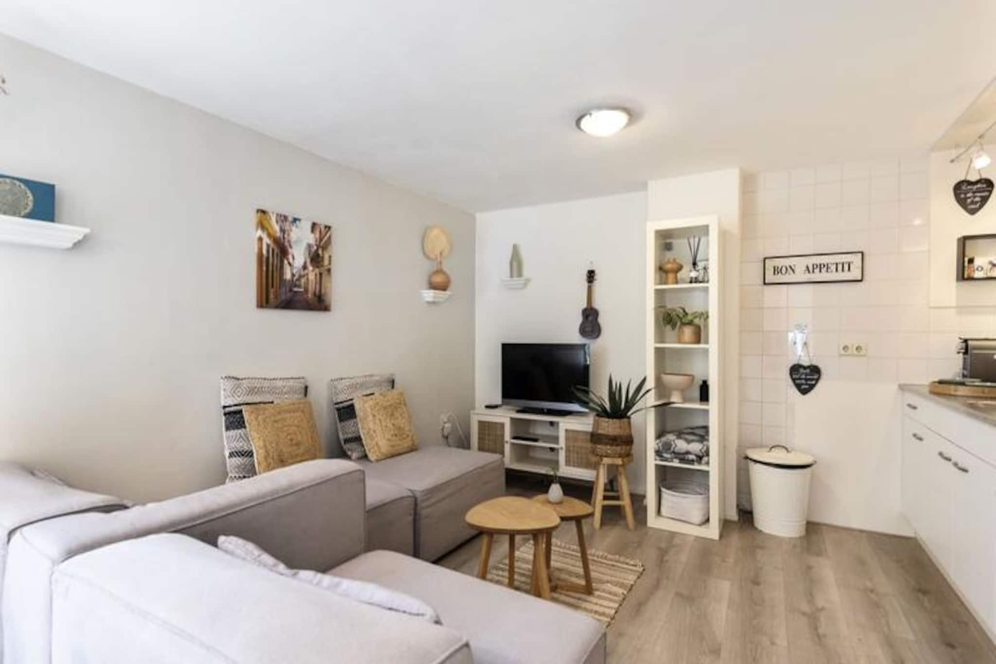 Step into a world of charm and tranquility with this delightful tiny house, nestled in a historic Dutch building dating back to 1900. Perfectly designed for a romantic escape, this cozy retreat combines old-world charm with modern comforts, offering an intimate haven just moments from the golden sands of Zandvoort beach. Imagine starting your mornings with a steaming cup of coffee on your private terrace, surrounded by the peaceful ambiance of this serene neighborhood. 

Inside, the recently renovated space welcomes you with a warm and inviting atmosphere. The fully equipped open-plan kitchen is perfect for preparing meals to enjoy together, while the private infrared sauna for two provides the ultimate relaxation after a day of exploring. The living area, complete with plush seating, invites you to unwind and savor quiet moments. Every detail, from the soft linens to the thoughtful amenities, has been curated to ensure a comfortable and memorable stay.

Located in the heart of Zandvoort, this tiny house offers unparalleled convenience. The beach is just a 5-minute stroll away, while the vibrant town center, with its charming shops and restaurants, is equally close. For those looking to explore further afield, the train station is a mere 10-minute walk, providing easy access to Amsterdam and Haarlem. Nature enthusiasts will delight in the nearby national parks, De Waterleidingduinen and Kennemerduinen, perfect for walking or cycling adventures.

Whether you’re seeking a peaceful seaside retreat or a base to explore the cultural treasures of the Netherlands, this tiny house offers the perfect blend of relaxation and adventure. Book your stay today and create unforgettable memories in this enchanting coastal escape.