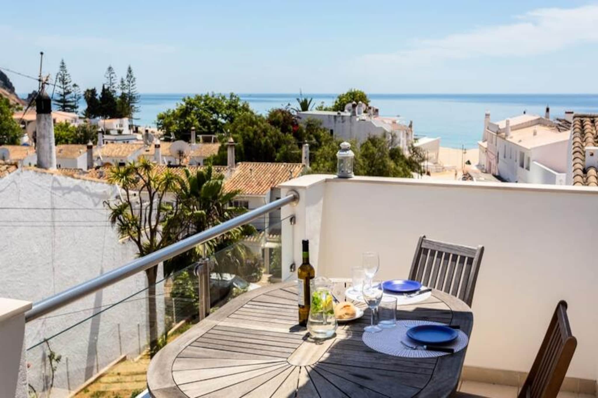 In the heart of Praia da Luz, where the golden sands meet the azure waters of the Algarve, this modern first-floor apartment offers an inviting retreat for families and friends alike. Imagine waking up to the gentle sea breeze and enjoying your morning coffee on the northeast-facing balcony, a serene spot to soak in the tranquil atmosphere of this charming seaside village. With its contemporary design and thoughtful amenities, this apartment promises a memorable getaway.
Step inside the spacious 45 m² apartment and discover a well-laid-out living space. The open-plan living, dining, and sleeping area features two single beds that can be joined to form a double, as well as an additional single bed, ensuring flexible sleeping arrangements for up to three guests. The fully equipped kitchen is perfect for preparing delicious meals, while the modern bathroom with a shower adds to the convenience. For those cooler evenings, electric heaters provide warmth, and air conditioning ensures comfort during the warmer months.
Just a two-minute walk from the beach, this apartment is a haven for water sports enthusiasts, offering easy access to surfing, snorkeling, diving, and sailing. The rooftop terrace is a must-visit, providing breathtaking views of Luz Bay and the surrounding cliffs. Nearby, you'll find a variety of bars, restaurants, and shops, making it easy to immerse yourself in the local culture. For a day trip, the vibrant town of Lagos is just a 15-minute drive away, offering a historic center, marina, and plenty of activities for all ages.
Whether you're seeking relaxation or adventure, this apartment is your gateway to the best of the Algarve. With its prime location, modern comforts, and stunning surroundings, it’s the perfect choice for an unforgettable holiday in Portugal.