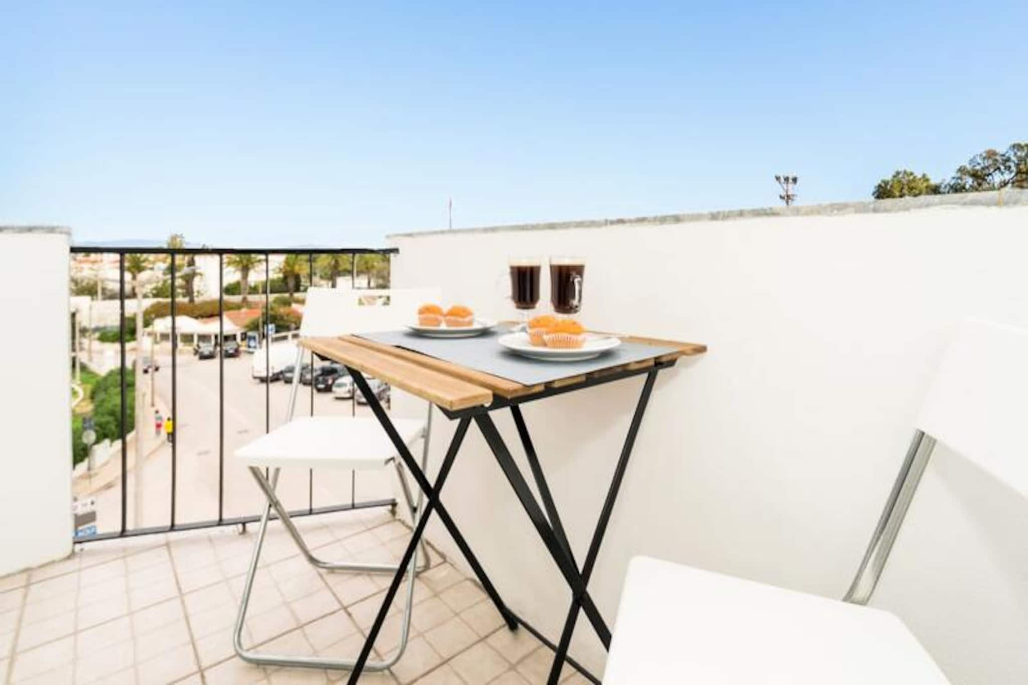 Wake up to the serene beauty of Meia Praia Beach and the majestic Monchique Mountains from this bright and stylish one-bedroom apartment in Lagos. Just a 10-minute walk from the golden sands of Dona Ana Beach and the enchanting cobbled streets of Lagos' historic center, this property offers the perfect blend of comfort, convenience, and breathtaking views, making it an ideal retreat for couples or small groups seeking a memorable Algarve escape.
The apartment is thoughtfully designed for relaxation and practicality. The spacious bedroom features a plush king-size bed, while the modern bathroom boasts a walk-in shower for a refreshing start to your day. The welcoming living room, complete with a sofa bed, provides additional sleeping arrangements for guests. A fully equipped kitchen invites you to prepare meals with fresh, local ingredients, and the southeast-facing balcony is the perfect spot to enjoy your morning coffee or unwind with a glass of wine as the sun sets over the city.
Situated on the second floor with elevator access, the apartment also includes a separate laundry area and covered balcony for added convenience. Air conditioning ensures a comfortable stay year-round, while Wi-Fi and television keep you connected and entertained. With two small supermarkets, charming cafes, and local restaurants nearby, you’ll have everything you need within walking distance.
Explore the wonders of Lagos, from the dramatic cliffs of Ponte da Piedade to the lively marina where history meets modern charm. Whether you’re strolling along the Pilgrims Walk, enjoying the vibrant nightlife, or venturing to the west coast for world-class surfing, this apartment serves as the perfect base for your Algarve adventure. With its stunning views, prime location, and thoughtful amenities, this is a place where unforgettable memories are made.