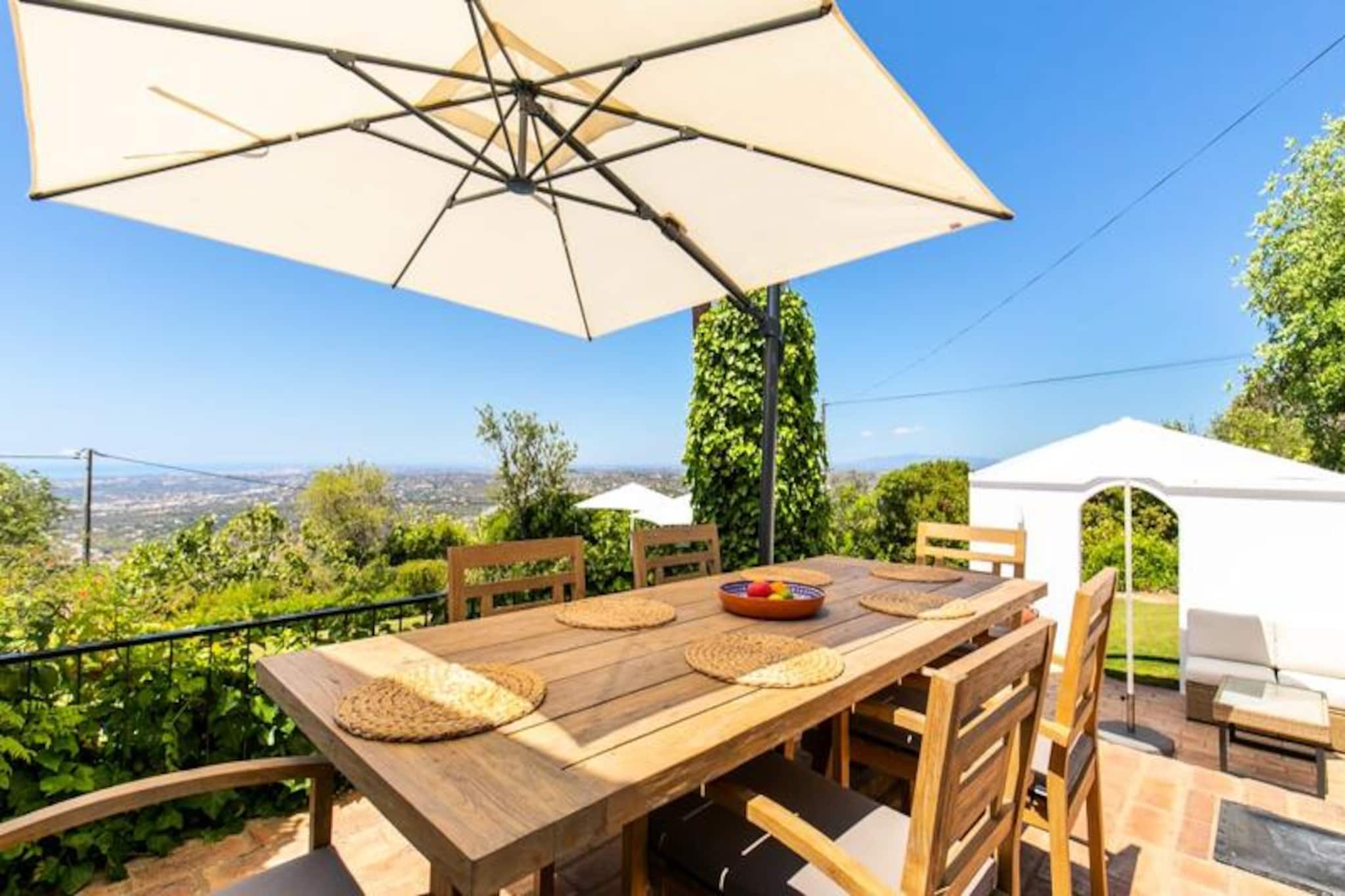 High above the picturesque Algarve coastline, this stunning 4-bedroom villa offers a serene retreat with breathtaking views of Vilamoura, Albufeira, and the Atlantic Ocean. Set amidst the rolling hills of Picota Loulé, this property combines traditional Portuguese charm with modern comforts, creating the perfect escape for families or groups seeking tranquility and luxury in equal measure. At an altitude of 350 meters, the villa provides an unparalleled vantage point to admire the beauty of the Algarve’s landscapes.
Inside, the villa features two spacious double bedrooms, including one with an en-suite bathroom and another with a large window framing the hillside views. Two additional twin bedrooms ensure ample space for up to eight guests. Each room is thoughtfully designed with comfortable beds, reversible air conditioning, and tasteful furnishings. The fully equipped kitchen, with its traditional style and modern appliances, invites you to prepare meals to enjoy in the cozy dining area or outdoors by the pool. The villa also boasts two heated bathrooms with luxurious rain showers and a laundry room for added convenience.
Step outside to discover your private oasis. The villa’s large garden, complete with a sparkling pool and a gas barbecue, is perfect for relaxing under the Algarve sun or enjoying al fresco dinners with loved ones. With Wi-Fi, television, and all linens provided, your stay will be as comfortable as it is memorable.
Located just 25 minutes from Faro Airport and a short drive from the vibrant marina of Vilamoura and the golden beaches of Albufeira, this villa offers the best of both worlds: peace and seclusion with easy access to the Algarve’s top attractions. Golf enthusiasts will appreciate the proximity to world-class courses, while the nearby town of Loulé offers a taste of authentic Portuguese culture with its markets, restaurants, and historical landmarks. Whether you’re here to unwind by the pool, explore the region’s natural beauty, or indulge in local cuisine, this villa is your gateway to an unforgettable Algarve experience.
