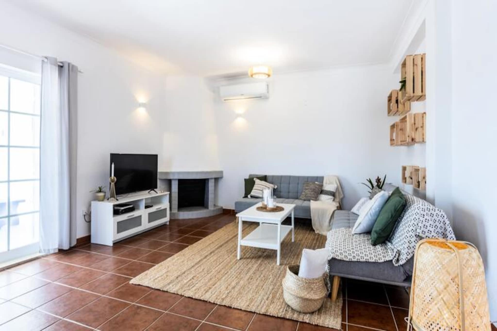 Imagine waking up to the sound of waves crashing against the cliffs and the scent of the ocean breeze filling the air. This stunning 3-bedroom villa, nestled in the serene Vale da Telha, offers an idyllic escape for families, nature lovers, and surfers alike. Situated just steps from the dramatic cliffs and the renowned Rota Vicentina coastal trails, this property is a gateway to the unspoiled beauty of Portugal’s Costa Vicentina Natural Reserve. Whether you’re seeking adventure or tranquility, this villa provides the perfect setting for unforgettable memories. 
 
 Step inside and discover a bright, spacious home designed for comfort and relaxation. The open-plan living and dining area, bathed in natural light from large bay windows, seamlessly connects to the south-facing veranda and private pool. The fully equipped kitchen, complete with a gas hob and electric oven, is perfect for preparing meals to enjoy al fresco on the veranda, which features a barbecue, sink, and ample storage. The villa’s three bedrooms offer restful retreats, with the master bedroom boasting an en-suite bathroom for added privacy. Built-in wardrobes in all rooms ensure plenty of storage for your stay.
 
 Outside, the fenced garden and private pool create a peaceful oasis where you can unwind in complete privacy. With Starlink internet and a 55-inch television, modern conveniences are at your fingertips. Linens and towels are provided, and a dedicated property management team is available to ensure your stay is seamless and enjoyable.
 
 The villa’s prime location places you just a 5-minute drive from the golden sands of Arrifana, Monte Clérigo, and Amoreira beaches. Local amenities, including cafes, restaurants, and supermarkets, are also within easy reach. For a taste of history and culture, the charming town of Aljezur is only 15 minutes away. Whether you’re exploring the rugged coastline, surfing world-class waves, or savoring local cuisine, this villa is your perfect base for discovering the Algarve’s hidden treasures.