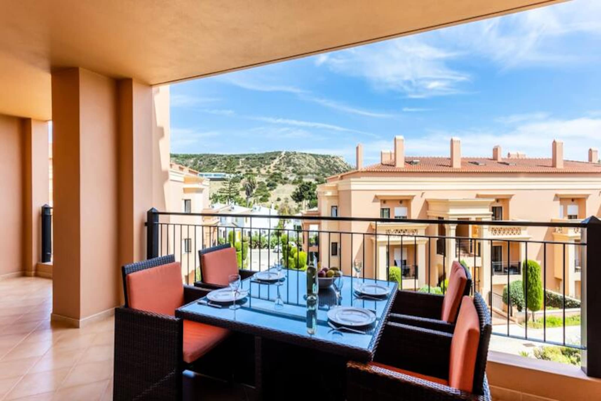 Bask in the beauty of Praia da Luz with a stay in this luxurious apartment, where the endless blue of the Atlantic Ocean meets the striking backdrop of Rocha Negra. This serene retreat offers a perfect blend of modern comfort and natural splendor, inviting you to unwind and recharge in the heart of the Algarve. Whether you're sipping your morning coffee on the balcony or strolling through the beautifully landscaped gardens, every moment here is infused with tranquility.
Inside, the apartment exudes sophistication with high-end finishes and state-of-the-art amenities. From underfloor heating and air conditioning to electric window shutters and a fully equipped kitchen with Siemens appliances, every detail has been thoughtfully designed for your comfort. The spacious living area is perfect for families or couples, accommodating up to 4 adults and 2 children. Satellite TV and Wi-Fi ensure you stay connected, while plush bedding and towels add an extra touch of luxury.
Situated within the Baía da Luz complex, the property boasts Roman-inspired architecture with Arabic influences, creating a village-like atmosphere. Guests can enjoy two large swimming pools, a heated children's pool, a tennis court, and a multi-sports field. The on-site Italian restaurant, Alloro, offers delicious meals overlooking the pool and gardens. For golf enthusiasts, several courses are just a short drive away.
Praia da Luz itself is a charming seaside village, perfect for families and nature lovers. Explore the calm, sandy beach, local shops, and restaurants, or venture to nearby Lagos, just 15 minutes away, for its lively marina and historic center. With Faro Airport only an hour's drive, this apartment is your gateway to an unforgettable Algarve escape.
