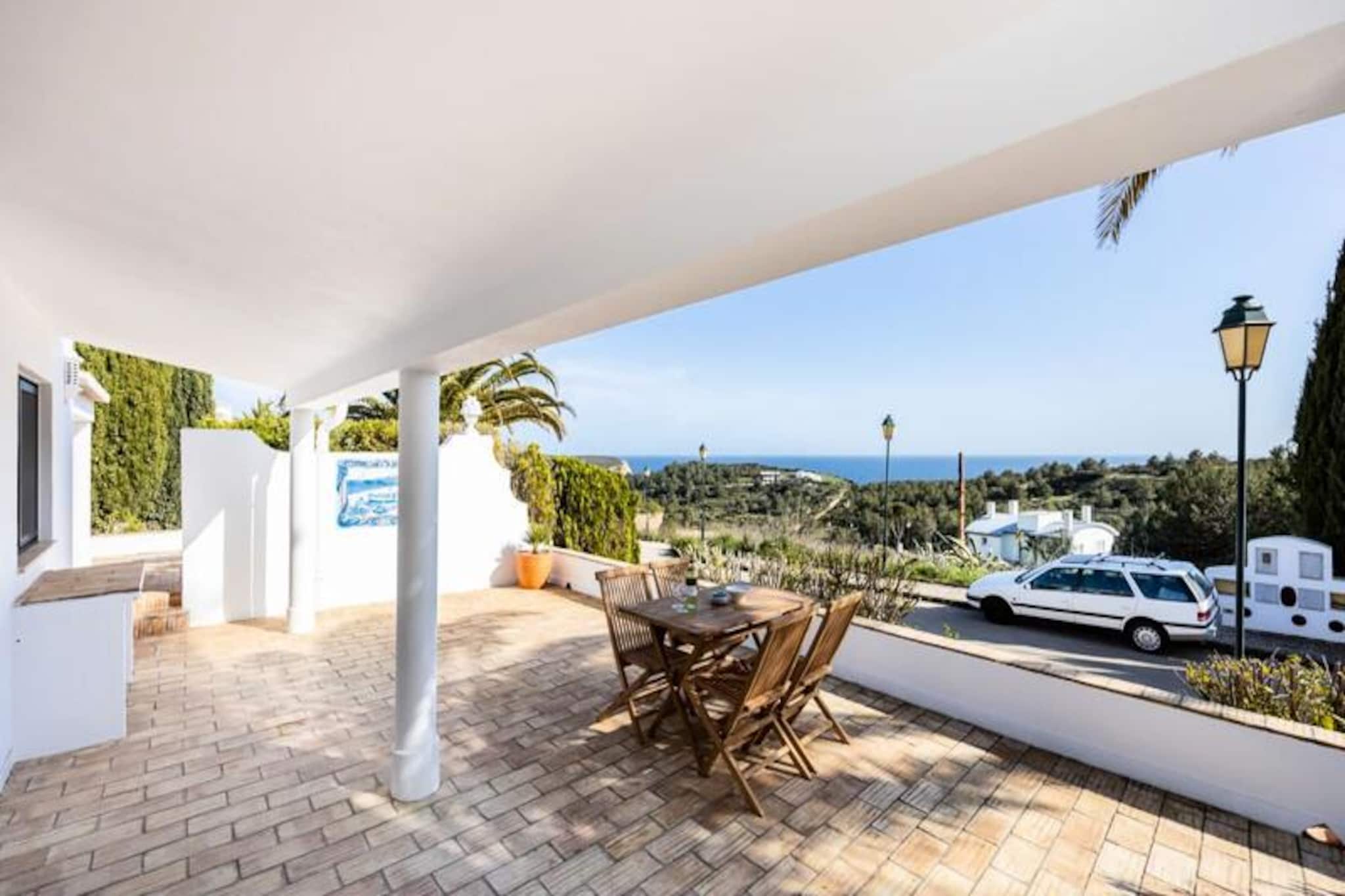 Imagine waking up to the serene sound of waves and the breathtaking sight of the Algarve cliffs meeting the endless blue of the Atlantic Ocean. Villa Miramar, nestled between the charming fishing villages of Burgau and Salema, offers a tranquil retreat in the heart of the southern Algarve. Completely renovated last year, this family villa has been transformed into three modern, private apartments, each designed for comfort and relaxation. Whether you're seeking a peaceful getaway or an adventure-filled holiday, this property delivers the perfect balance of both. 

This one-bedroom apartment is a haven of comfort, featuring two single beds, a spacious bathroom, and a cozy living room with a fully equipped kitchen. Step outside onto your private patio, where you can unwind with a glass of wine and soak in the stunning views of the surrounding cliffs and ocean. Modern amenities such as Wi-Fi, a television, a dishwasher, and a combination microwave/oven ensure that your stay is as convenient as it is relaxing. Linens and towels are provided, and shared parking is available on-site for your convenience. 

The location is ideal for exploring the Algarve's natural beauty. Praia do Burgau, a sheltered beach perfect for sunbathing and swimming, is just a short drive away. For golf enthusiasts, three top-notch courses are within a 15-minute drive. The historic town of Lagos, with its vibrant nightlife, marina, and diverse dining options, is only 8 kilometers away. Surfing, hiking, fishing, and diving are just a few of the activities you can enjoy in this picturesque region. 

With Faro Airport just an hour's drive away and ample free parking, Villa Miramar is the perfect base for your Algarve adventure. Whether you're here to relax under the sun, explore the rugged coastline, or immerse yourself in the local culture, this apartment offers everything you need for an unforgettable holiday.
