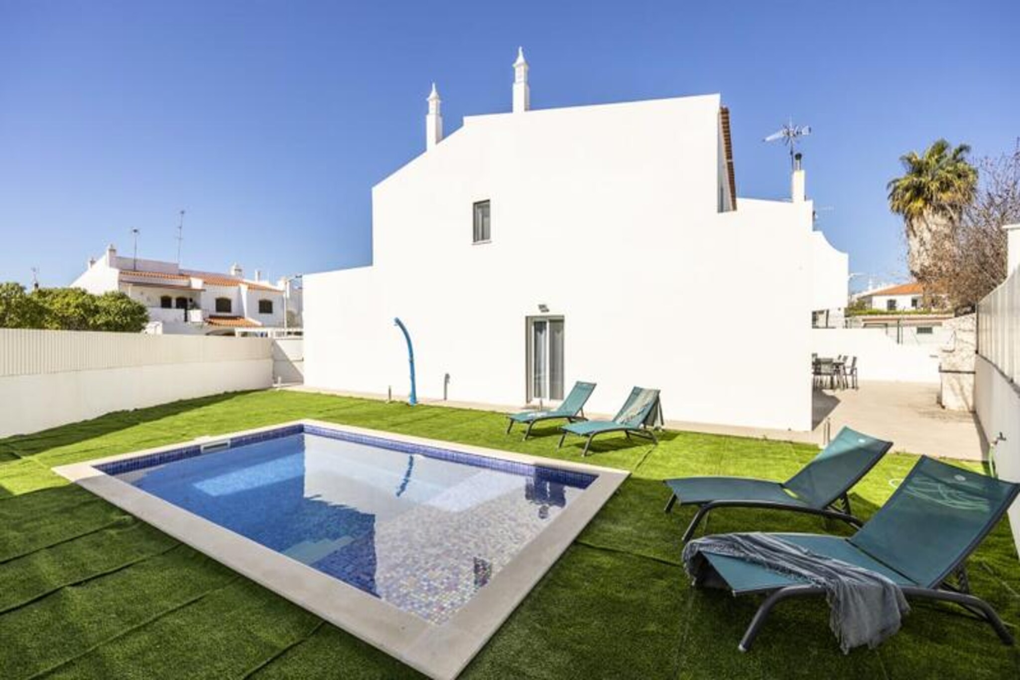 In the heart of the Algarve, where golden beaches meet azure waters, Villa Altura Dreams offers an idyllic escape for families and friends seeking relaxation and adventure. This contemporary four-bedroom villa, just minutes from the ocean, invites you to experience the best of Portugal’s southern coast with its sun-drenched terraces, private pool, and luxurious amenities. Whether you’re savoring the morning breeze with a coffee or enjoying a sunset barbecue on the terrace, every moment here is designed to delight. 

Inside, the villa’s 200 square meters of modern elegance unfold across two spacious floors. The open-plan living area seamlessly connects the fully equipped kitchen to the cozy lounge, creating a perfect space for shared meals and conversations. Upstairs, three bright bedrooms provide restful retreats, while the ground floor features an additional bedroom for added convenience. Air conditioning ensures comfort throughout, while high-speed Wi-Fi and a large television make it easy to unwind after a day of exploration. The villa’s refined furnishings and thoughtful design create an atmosphere of effortless sophistication. 

Step outside to your private oasis, where the sparkling pool invites you to cool off under the Algarve sun. Nearby, the award-winning beaches of Praia de Tavira and the pristine Ria Formosa Natural Park await, offering endless opportunities for kayaking, paddleboarding, or simply soaking in the natural beauty. For those seeking activity, the local leisure center boasts tennis courts, a football pitch, and an indoor swimming pool. 

Villa Altura Dreams is more than just a holiday home—it’s a gateway to unforgettable memories. Whether you’re exploring the vibrant local culture, indulging in fresh seafood, or simply relaxing by the pool, this villa is your perfect Algarve retreat.