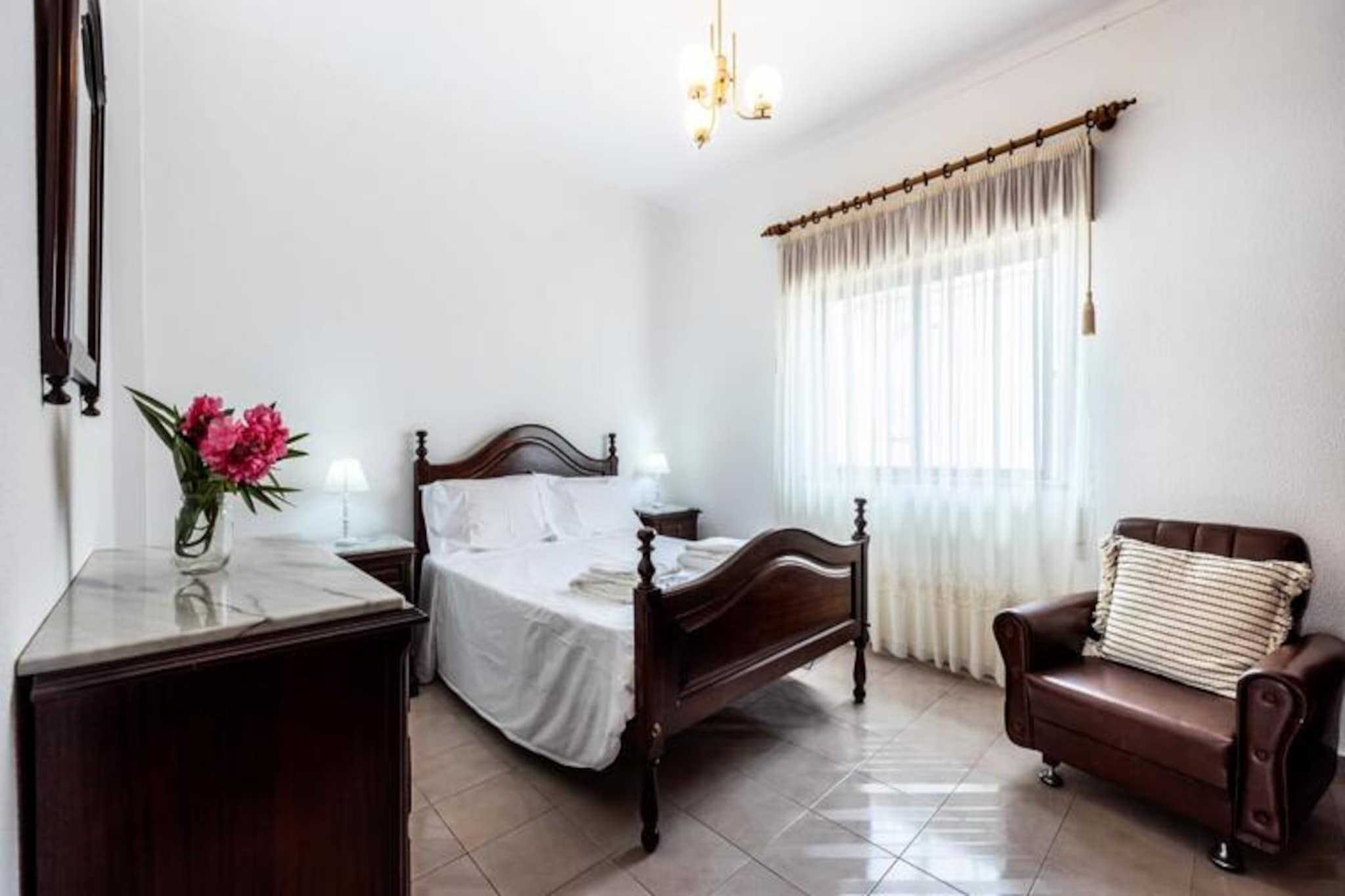 In the serene coastal town of Altura, Algarve, Alagoa Apartment offers a haven of comfort and tranquility for families and friends seeking a memorable holiday escape. Here, the golden beaches of the Algarve meet the charm of a peaceful neighborhood, creating the perfect setting for relaxation and exploration. Wake up to the gentle sea breeze and enjoy the laid-back atmosphere that defines this beautiful region of Portugal. 
 
 This spacious 3-bedroom apartment is thoughtfully designed to accommodate up to 4 adults and 2 children. The living area invites you to unwind with its cozy TV corner and dining space, perfect for sharing meals or enjoying a movie night. The separate kitchen is a dream for cooking enthusiasts, equipped with modern appliances including a washing machine, oven, microwave, and coffee maker. Step out onto the balcony for a morning coffee or an evening glass of wine, soaking in the peaceful surroundings. 
 
 The sleeping arrangements are tailored for comfort and privacy. Two double bedrooms provide a restful retreat for adults, while the third bedroom, featuring a bunk bed, is a delightful space for children. With Wi-Fi, TV, and all linens and towels provided, every detail has been considered to ensure a seamless stay. 
 
 Beyond the apartment, Altura’s unspoiled beaches and the stunning Ria Formosa Natural Park await your discovery. Take a short drive to Tavira Beach, renowned for its pristine sands and crystal-clear waters, or explore the charming town of Tavira itself. For active travelers, nearby leisure facilities include tennis courts, a football pitch, and an indoor swimming pool. Whether you’re kayaking through the natural park or savoring local delicacies, Alagoa Apartment places you at the heart of it all. 
 
 Book your stay today and create unforgettable memories in the Algarve’s coastal paradise. With its blend of comfort, convenience, and natural beauty, Alagoa Apartment is your perfect home away from home.