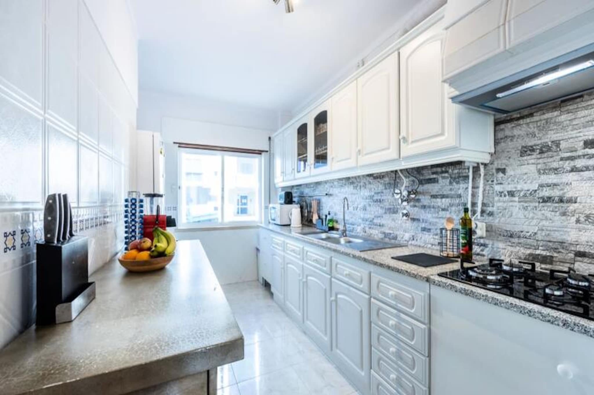 In the heart of the Algarve, this beautifully renovated 3-bedroom apartment offers a serene retreat just a short walk from the historic charm of Portimão. Imagine waking up to the soft glow of sunlight streaming through large windows, stepping out into a quiet residential neighborhood, and feeling the gentle sea breeze as you plan your day. Whether you’re here to explore the cobbled streets of the old town, relax on golden beaches, or indulge in local cuisine, this apartment is the perfect base for your adventures. 

Thoughtfully updated in 2022, the apartment combines modern comfort with traditional Portuguese charm. It accommodates up to six guests across three bright bedrooms: a queen-size master bedroom, a children’s room with two single beds, and a flexible twin room where the beds can be joined. Two bathrooms, one with a bathtub and the other with a shower, ensure convenience for families or groups. The fully equipped kitchen invites you to prepare meals with fresh local ingredients, while the cozy living area, complete with Wi-Fi and a television, provides a space to unwind after a day of exploration. Linens, towels, and ample free street parking are all provided for your convenience.

Located just a 15-minute walk from Portimão’s vibrant marina and historic center, you’ll find everything you need within easy reach. Stroll to nearby supermarkets or enjoy a short drive to the Aqua Shopping Mall for a wider selection. The stunning Praia da Rocha beach is also within walking distance, offering soft sands and crystal-clear waters. For those seeking adventure, the area boasts water sports, hiking trails, and world-class golf courses. Faro Airport is just a 40-minute drive away, making your arrival and departure seamless.

Whether you’re here to soak up the sun, explore the Algarve’s natural beauty, or immerse yourself in Portuguese culture, this apartment offers a tranquil and well-connected haven to create unforgettable memories.