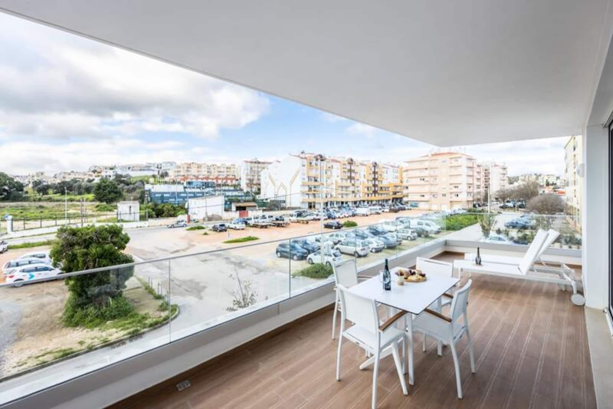 Wake up to the gentle sea breeze and the vibrant energy of Lagos Marina in this stunning, brand-new 2-bedroom apartment. Perfectly situated near the heart of Lagos, this modern retreat offers a harmonious blend of luxury and comfort, making it an ideal choice for your next getaway. From the private balcony, you can soak in the picturesque views of the city while sipping your morning coffee or enjoying a relaxing evening under the stars. 
 
 Step inside and discover a thoughtfully designed space featuring contemporary décor, a fully equipped kitchen, and high-speed Wi-Fi to keep you connected. The apartment also boasts access to two shared outdoor pools, perfect for a refreshing dip after a day of exploring. Fitness enthusiasts will appreciate the on-site gym, while the spacious living area invites you to unwind in style. With linens and towels provided, every detail has been considered to ensure a seamless and comfortable stay. 
 
 Just a short 5-minute walk from the Marina, you’ll find an array of restaurants, bars with live music, and supermarkets to cater to all your needs. Lagos is renowned for its breathtaking cliffs and pristine beaches, making it a haven for water sports enthusiasts. Whether you’re kayaking along the dramatic coastline, surfing the Atlantic waves, or simply basking in the sun, there’s something for everyone. The charming historic center, with its cobblestone streets and vibrant atmosphere, is a must-visit for shopping and dining. 
 
 Easily accessible from Faro Airport, Lagos is the perfect destination for those seeking a mix of relaxation and adventure. Book your stay today and create unforgettable memories in this coastal paradise.