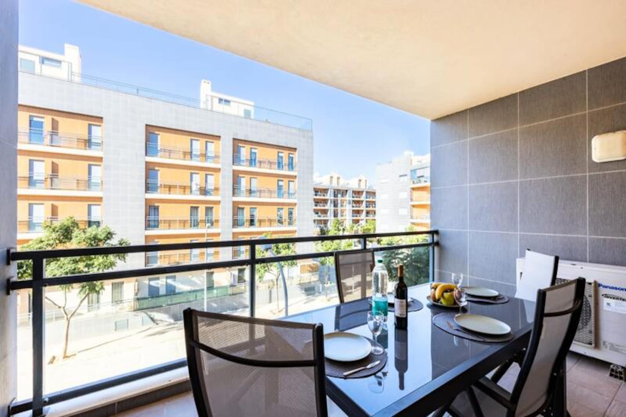 Where the golden Algarve sun meets the tranquil waters of the Atlantic, this bright and spacious 2-bedroom apartment offers the perfect retreat for your next getaway. Situated just behind the Olhátildeo seafront, the property combines modern comfort with a prime location, making it ideal for families or couples seeking a relaxing escape. From your private balcony, enjoy serene views of the ocean and the quiet residential street below, while the rooftop terrace with a pool provides a stunning vantage point for soaking in the coastal beauty. 

Inside, the apartment is thoughtfully designed to ensure your stay is as comfortable as possible. Both bedrooms are air-conditioned, with one featuring an en-suite bathroom for added privacy. The fully equipped kitchen invites you to prepare delicious meals, while the open-plan living and dining area is perfect for unwinding after a day of exploration. High-speed Wi-Fi, television, and provided linens and towels ensure a hassle-free experience. The large balcony is the perfect spot to sip your morning coffee or enjoy an evening glass of wine while taking in the peaceful surroundings. 

Step outside, and you’ll find yourself just moments away from Olhátildeo’s vibrant seafront, dotted with a variety of restaurants, bars, and shops. The town’s charming historic center is a short stroll away, offering a glimpse into traditional Portuguese culture. For those looking to explore further, ferries to the idyllic islands of Culatra, Armona, and Deserta are just a 10-minute walk from the apartment, with private water taxis conveniently stopping right outside. 

Whether you’re here to relax by the pool, explore the Algarve’s stunning coastline, or immerse yourself in the local culture, this apartment offers the perfect base for an unforgettable holiday. Book your stay today and let the magic of Olhátildeo captivate you.