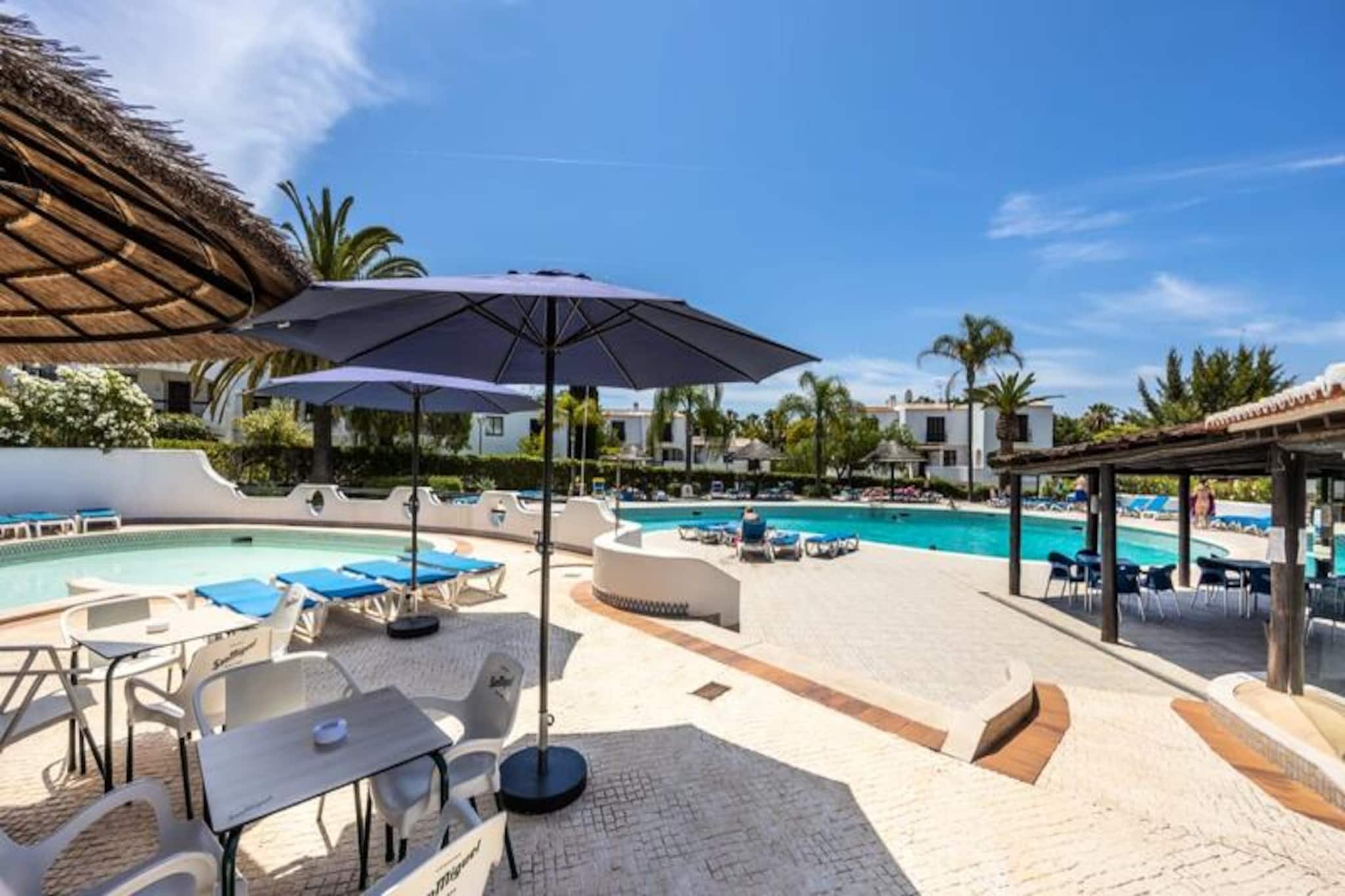In the heart of the Algarve's golden coast, this charming ground-floor apartment in São Rafael offers a serene escape just minutes from Albufeira's vibrant energy. Imagine waking up to the gentle sea breeze, surrounded by lush gardens, and knowing that the stunning São Rafael beach is just a five-minute walk away. Whether you're seeking a tranquil retreat or a base for exploring the Algarve, this property promises an unforgettable stay. 
 
 The apartment is designed with comfort and relaxation in mind, featuring two beautifully appointed bedrooms – one with a queen-size bed and the other with twin beds, ideal for families or friends. The spacious living room, complete with a sofa bed, offers additional sleeping space, while the fully equipped kitchen invites you to prepare delicious meals with fresh local ingredients. Modern amenities such as free Wi-Fi, a flat-screen TV, and air conditioning ensure a comfortable and convenient stay. Step outside to your private garden, a perfect spot for morning coffee or an evening glass of wine. 
 
 Beyond the apartment, São Rafael beach beckons with its golden sands and crystal-clear waters, perfect for sunbathing, swimming, or simply unwinding. The area is dotted with excellent restaurants and bars, offering a taste of authentic Portuguese cuisine and vibrant nightlife. For those looking to explore, Albufeira's Old Town, with its charming cobblestone streets and bustling markets, is just a short drive away. Adventure seekers can enjoy boat tours, water sports, or a visit to the nearby Zoomarine park, while nature lovers will appreciate the scenic coastal trails. 
 
 Whether you're here to relax by the beach, explore the Algarve's treasures, or savor its culinary delights, this apartment provides the perfect home base. Book your stay today and create lasting memories in one of Portugal's most beautiful destinations.