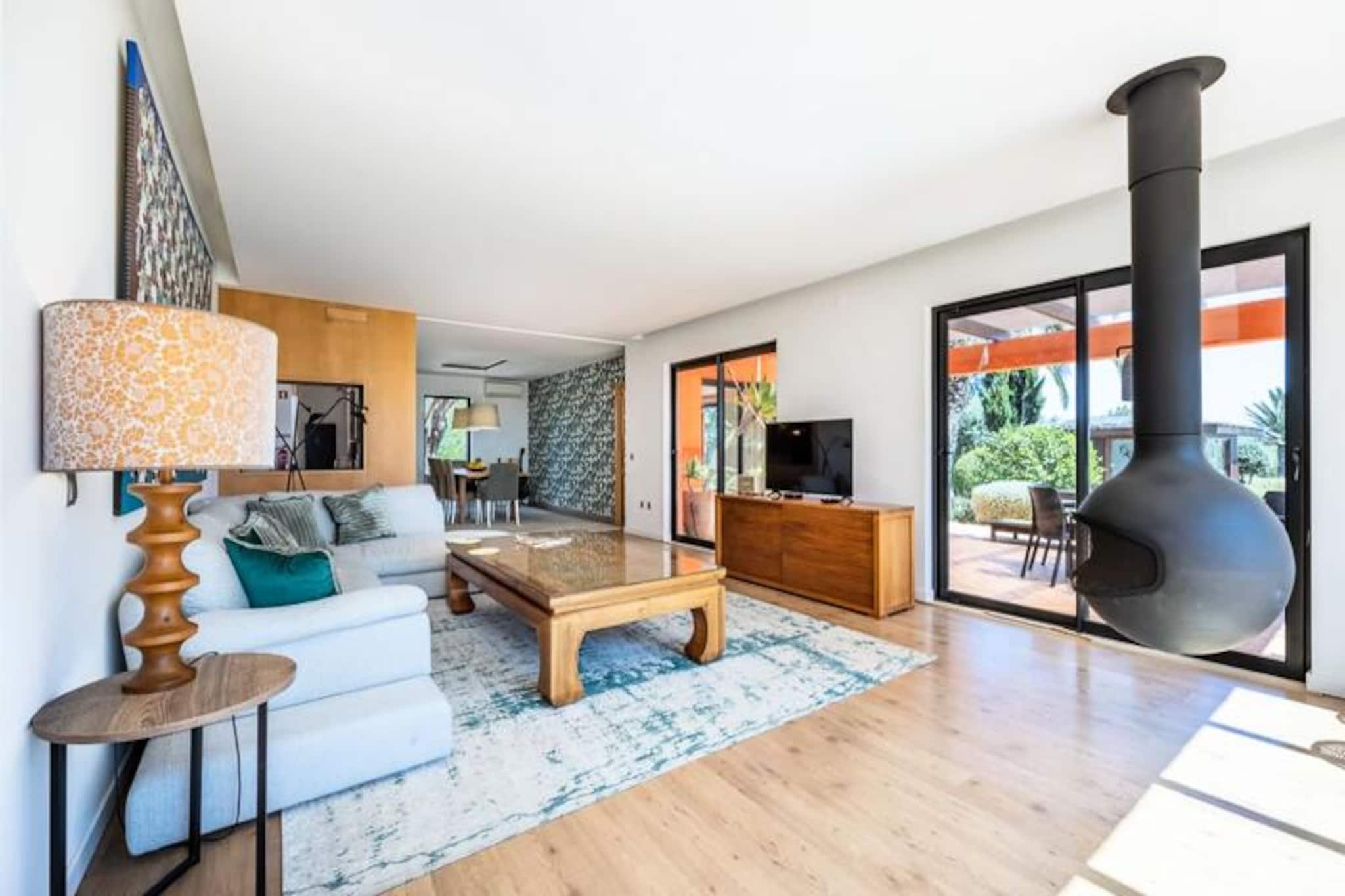 Step into a world of sun-kissed serenity at Sagres Villa Cercado, where the golden beaches of Portugal’s Algarve meet the azure waves of the Atlantic. This stunning villa is a haven for those seeking an escape filled with relaxation, adventure, and natural beauty. Imagine waking up to the sound of the ocean breeze, enjoying your morning coffee in a lush garden, and spending your days exploring pristine beaches or riding the perfect surf. Whether you’re here to unwind or chase the thrill of outdoor activities, this villa offers the perfect base for your dream getaway.
Designed with comfort and style in mind, Sagres Villa Cercado features four spacious bedrooms that can accommodate up to eight guests. The villa’s open-plan layout includes a fully equipped kitchen, a bright and airy living room with multilingual satellite TV, and air conditioning to keep you cool during warm summer days. Step outside to discover your private oasis: a large garden with a sparkling pool, a barbecue area, and a terrace perfect for al fresco dining under the stars. Free Wi-Fi ensures you stay connected, while linens and towels are provided for your convenience.
Located just 1 km from the breathtaking Beliche Beach and other stunning coastal gems, this villa is a paradise for water sports enthusiasts. Surf, windsurf, kayak, or paddleboard to your heart’s content, or explore the nearby cliffs and nature trails for unforgettable views. The vibrant town of Sagres, with its charming restaurants, shops, and surf boutiques, is just a short stroll away, while Cabo de São Vicente, famously known as “the end of the world,” is a quick drive from your doorstep.
Whether you’re planning a family holiday or a retreat with friends, Sagres Villa Cercado promises an unforgettable experience. Book your stay today and let the Algarve’s beauty, tranquility, and adventure captivate your soul.