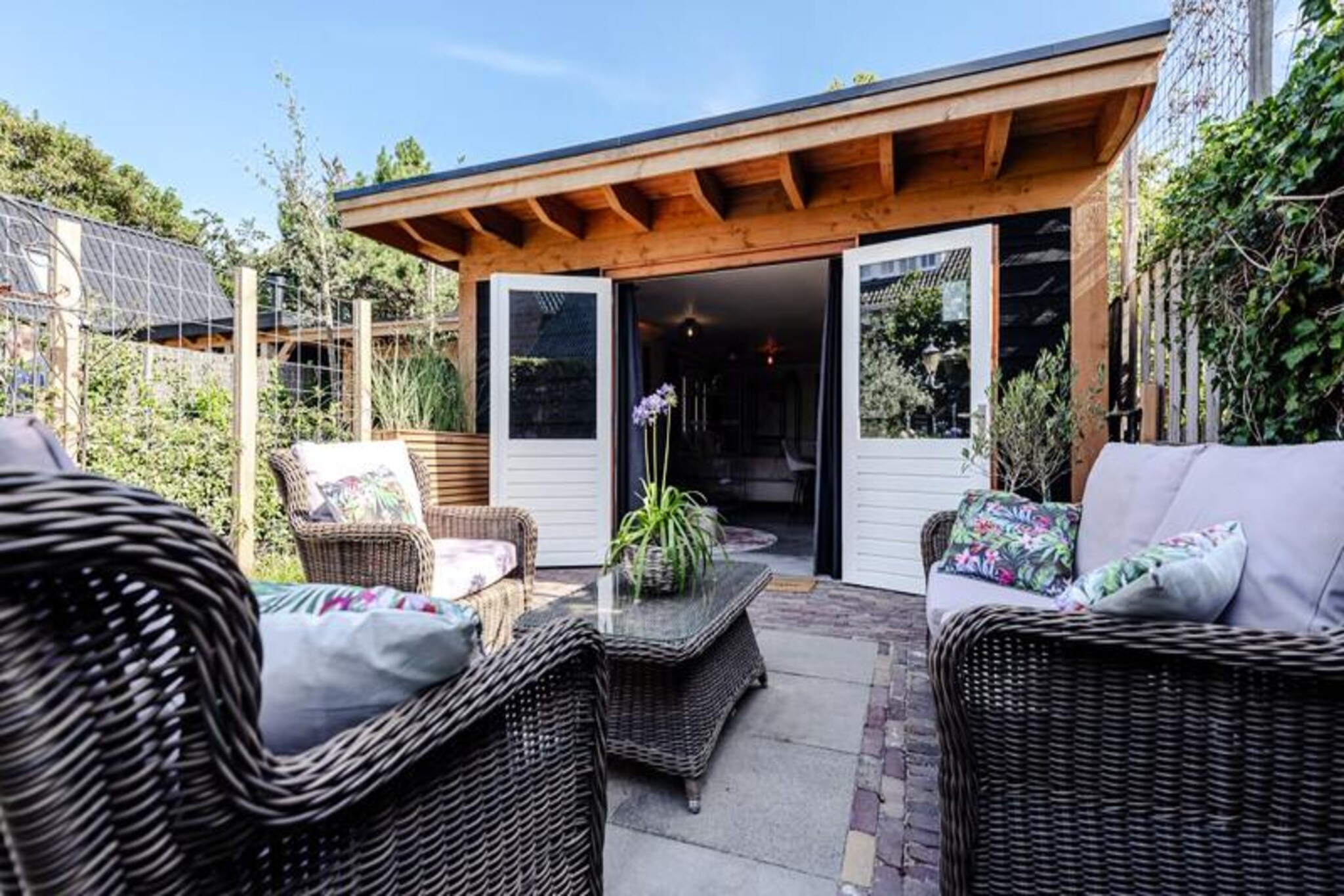 Step into a world of tranquility at this charming garden studio in Zandvoort, where the soothing rhythm of the sea meets modern comfort. Perfectly tailored for couples seeking a romantic escape, this brand-new retreat offers an intimate blend of elegance and serenity. Imagine waking up to the gentle sound of waves, enjoying a morning coffee on your private terrace, and setting off for a day of exploration along the stunning coastline. \n\nInside, the studio is thoughtfully designed to ensure your stay is as comfortable as possible. A fully equipped kitchen with a Nespresso machine, dishwasher, and oven invites you to prepare delicious meals together. The stylish interior, complemented by Wi-Fi and television, creates a cozy space to unwind after a day of adventure. Linens and towels are provided, and private parking ensures convenience throughout your stay. Sharing the lush garden with your friendly hosts and their adorable pets adds a warm, welcoming touch to your experience.\n\nLocated just minutes from Zandvoort’s vibrant town center and pristine beaches, this property places you at the heart of everything. Stroll hand in hand along the shore, savor fresh seafood at nearby restaurants, or explore the lively beach clubs in summer. Nature lovers will adore the proximity to De Waterleidingduinen and Kennemerduinen national parks, offering exceptional hiking and cycling trails. For water sports enthusiasts, surfing, kitesurfing, and diving opportunities abound.\n\nWith Amsterdam just a short train ride away, Zandvoort offers the perfect balance of seaside relaxation and urban excitement. Book your stay today and create unforgettable memories in this enchanting coastal haven.