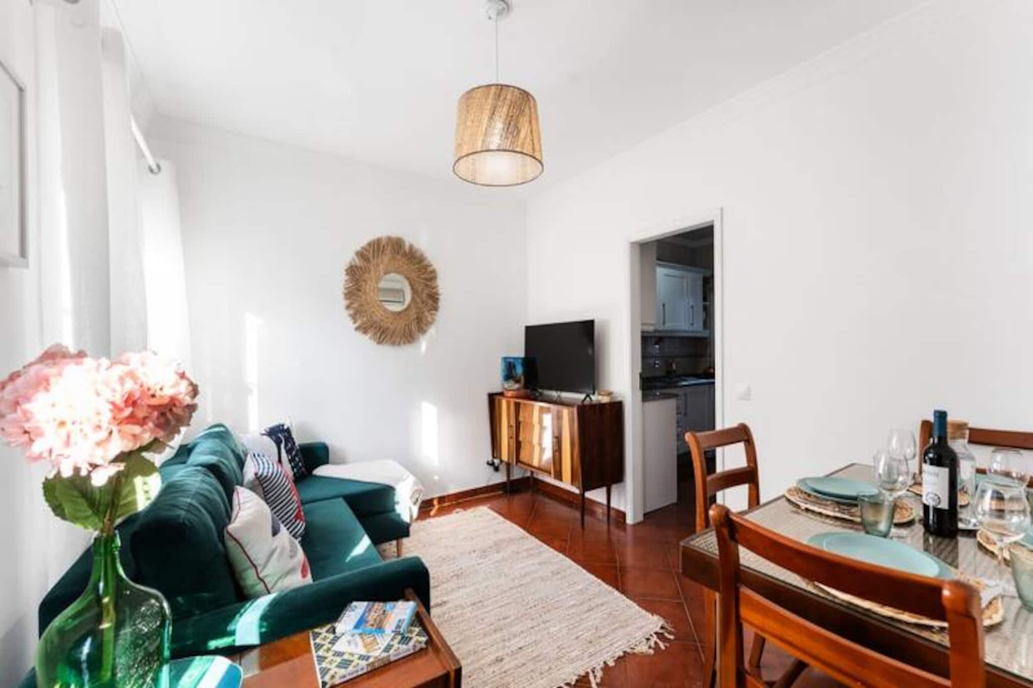 In the heart of Tavira, where cobbled streets meet the gentle rhythm of the Ria Formosa, this charming three-story townhouse invites you to experience the essence of Portuguese living. With its blend of traditional charm and modern amenities, this home offers a serene retreat for families and friends alike. Imagine waking up to the soft glow of the Algarve sun, stepping onto your private balcony, and savoring a fresh coffee as the town comes to life around you. 

This beautifully designed townhouse boasts two spacious bedrooms and three bathrooms, ensuring comfort and privacy for all guests. The ground floor features a seamless flow between the living, dining, and kitchen areas, creating a warm and inviting space for shared meals and moments. Culinary enthusiasts will delight in the fully equipped kitchen, perfect for preparing dishes inspired by the local markets. The upper floor offers a cozy lounge with a music system, ideal for unwinding or hosting intimate gatherings. Step outside to the interior patio, where an outdoor shower provides a refreshing escape after a day at the beach. 

Tavira’s vibrant culture is at your doorstep. A short stroll leads you to the ferry connecting to the pristine Praia de Tavira, a stunning 11-kilometer stretch of golden sands. Explore the Ria Formosa Natural Reserve, one of Portugal’s seven natural wonders, or enjoy the town’s leisure center with its pool, tennis courts, and football pitch. Golf enthusiasts will find world-class courses nearby, including the renowned Monte Rei. 

Whether you’re here to immerse yourself in Tavira’s rich history, indulge in its culinary delights, or simply relax by the sea, this townhouse offers the perfect base for your Algarve adventure. Book your stay today and let Tavira’s charm captivate you.