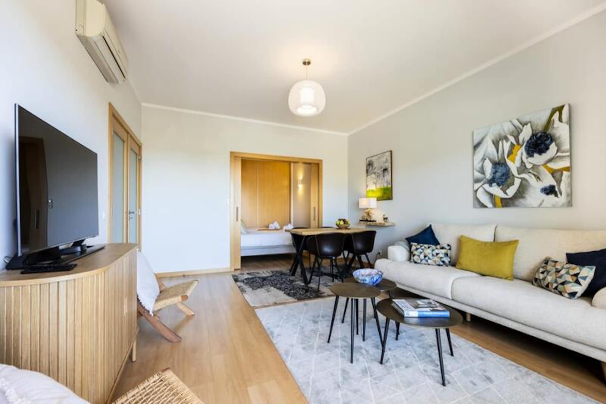 Imagine waking up to serene views of the Olhátildeo Lagoon, where the gentle ripples of the water and the golden hues of the Algarve sun create the perfect start to your day. This modern and elegant apartment offers a stylish retreat in the heart of Olhátildeo, blending contemporary design with the natural beauty of its surroundings. Whether you're seeking a peaceful escape or an adventure-filled holiday, this property is your gateway to the best of the Algarve. 

Step into a bright and airy interior, thoughtfully designed with clean lines and modern furnishings. The open-plan living area flows seamlessly onto a west-facing private balcony, where you can savor your morning coffee or unwind with a sunset cocktail while taking in the breathtaking lagoon views. The two bedrooms feature brand-new electric beds for ultimate comfort, while the two bathrooms ensure ample space and privacy for all guests. For a touch of luxury, head to the rooftop pool, where panoramic vistas of the coastline await as you cool off under the sun. 

Conveniently located, the apartment is just a short walk from the vibrant town center of Olhátildeo, known for its rich Portuguese heritage and lively atmosphere. Explore the nearby islands of Armona and Culatra, accessible by ferry, or enjoy the local shops, restaurants, and bars that are just minutes away. A supermarket is within a 5-minute walk, making it easy to stock up on essentials. Public transport, taxis, and Uber are readily available, while free and paid parking options make it simple to explore the wider Algarve region by car. 

Whether you're here to relax by the lagoon, discover the charm of Olhátildeo, or venture into the stunning Algarve countryside, this apartment offers the perfect balance of comfort, convenience, and unforgettable views. Book your stay today and create lasting memories in this coastal haven.