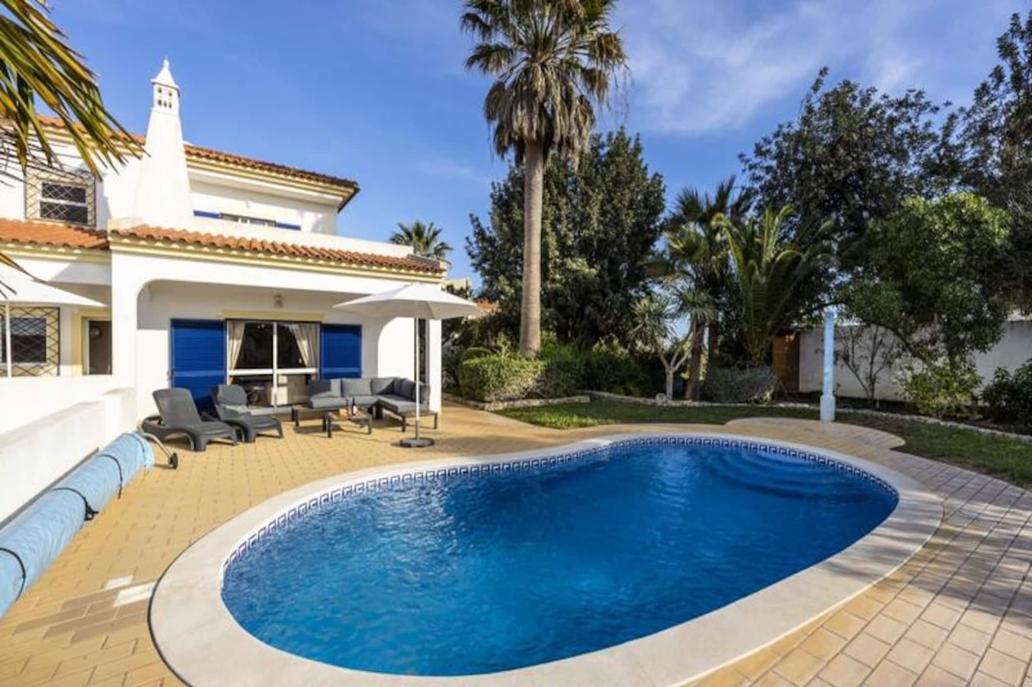 In the serene countryside of the Algarve, Casa Neel offers a luxurious escape for up to six guests. This elegant villa is set amidst the tranquil Maritenda Boliqueime area, where the charm of rural Portugal meets modern comfort. Imagine waking up to the gentle rustle of fruit trees in the garden and enjoying your morning coffee on a sunlit terrace with panoramic views of the surrounding landscape. Casa Neel is a haven for those seeking peace and relaxation, yet it’s just minutes away from the vibrant attractions of the Algarve. 

The villa boasts three spacious bedrooms, each with air conditioning and en-suite bathrooms, ensuring privacy and comfort for all guests. A fourth WC on the ground floor adds convenience, especially for those with mobility needs. The fully equipped kitchen, featuring modern appliances, invites you to prepare delicious meals, while the large living room with international TV channels and a wood-burning stove offers a cozy retreat for evenings. Outdoors, the private heated pool, lush garden, and gas barbecue set the stage for unforgettable moments under the Algarve sun.

Casa Neel’s location is ideal for exploring the region. The stunning beaches of Falésia and Vilamoura are just a 10-minute drive away, perfect for sunbathing or water sports. Golf enthusiasts will appreciate the proximity to world-class courses, and families can enjoy a day at the nearby Aquashow water park. The charming village of Boliqueime, with its traditional Portuguese character, is just minutes away, offering local dining and cultural experiences.

Whether you’re seeking adventure or tranquility, Casa Neel provides the perfect base for your Algarve getaway. With its blend of luxury, comfort, and prime location, this villa promises a memorable stay for families and responsible travelers. Book now and let the beauty of the Algarve captivate you.
