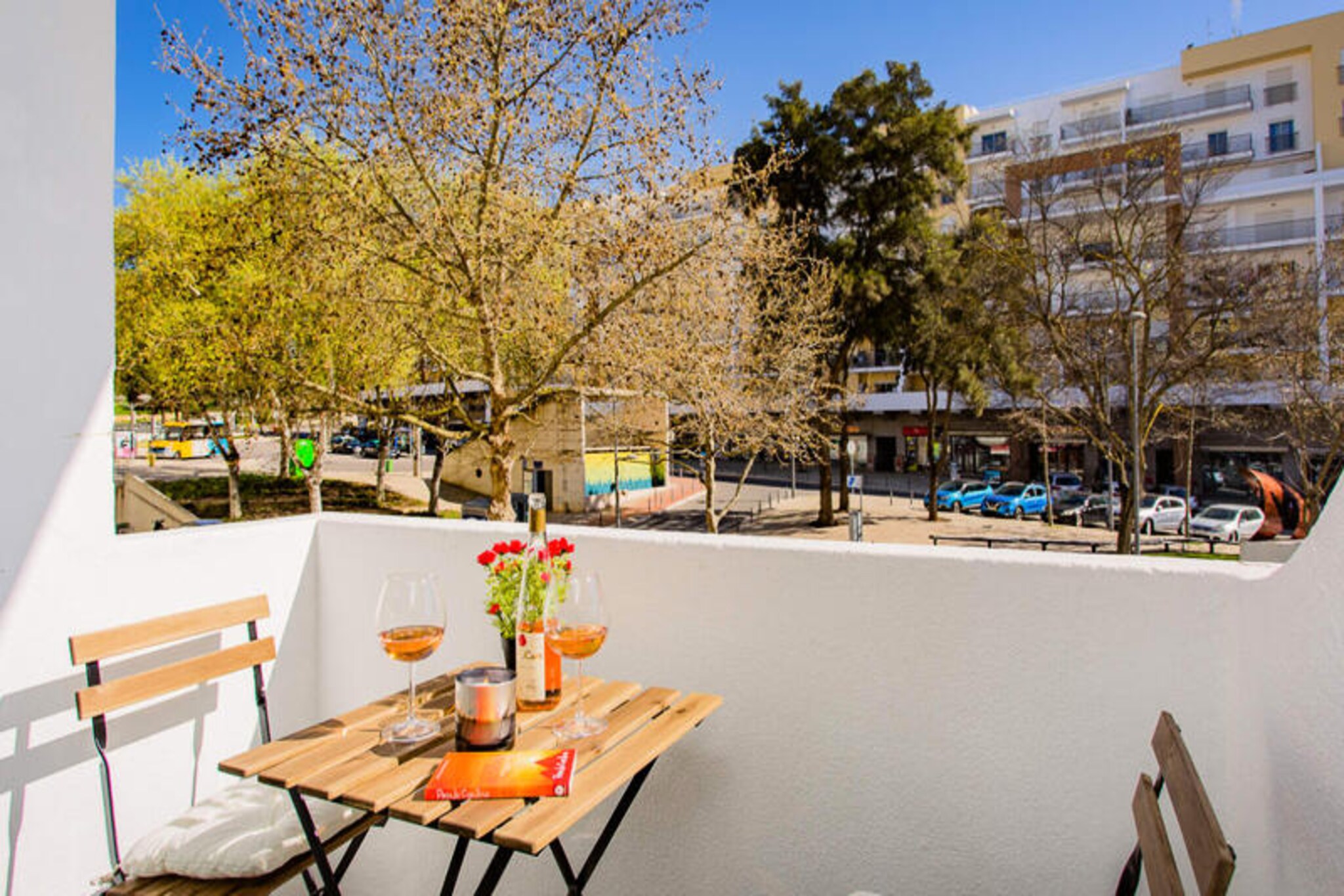 In the heart of Albufeira's Old Town, where cobblestone streets meet the golden Algarve coastline, this charming one-bedroom apartment offers couples a serene escape just moments from the beach. Imagine waking up to the sound of seagulls and the scent of the ocean, stepping out onto your private balcony to soak in the morning sun before exploring the vibrant streets below. This is a retreat where romance and relaxation intertwine seamlessly. 

Inside, the apartment is a haven of modern elegance. The spacious living room invites you to unwind with its contemporary furnishings and soft lighting, perfect for intimate evenings after a day of adventure. The fully equipped kitchen, complete with state-of-the-art appliances, ensures you can prepare everything from a quick breakfast to a romantic dinner for two. The bedroom, your private sanctuary, features a plush bed adorned with high-quality linens, promising restful nights and lazy mornings. Wi-Fi, television, and all essential amenities are provided to make your stay as comfortable as possible.

Step outside, and Albufeira's Old Town unfolds at your feet. Wander through its lively squares, discover quaint cafes and boutique shops, or indulge in fresh seafood at one of the many local restaurants. Praia de Peneco and Praia dos Pescadores are just a three-minute walk away, offering soft sands and crystal-clear waters perfect for sunbathing or a refreshing swim. For those seeking adventure, the nearby marina offers boat tours along the stunning Algarve coast, while the vibrant Oura district provides a lively nightlife scene.

Whether you're here to relax on the beach, explore the rich culture of the Old Town, or embark on coastal adventures, this apartment is your perfect base. Create unforgettable memories in one of Portugal's most enchanting seaside destinations.