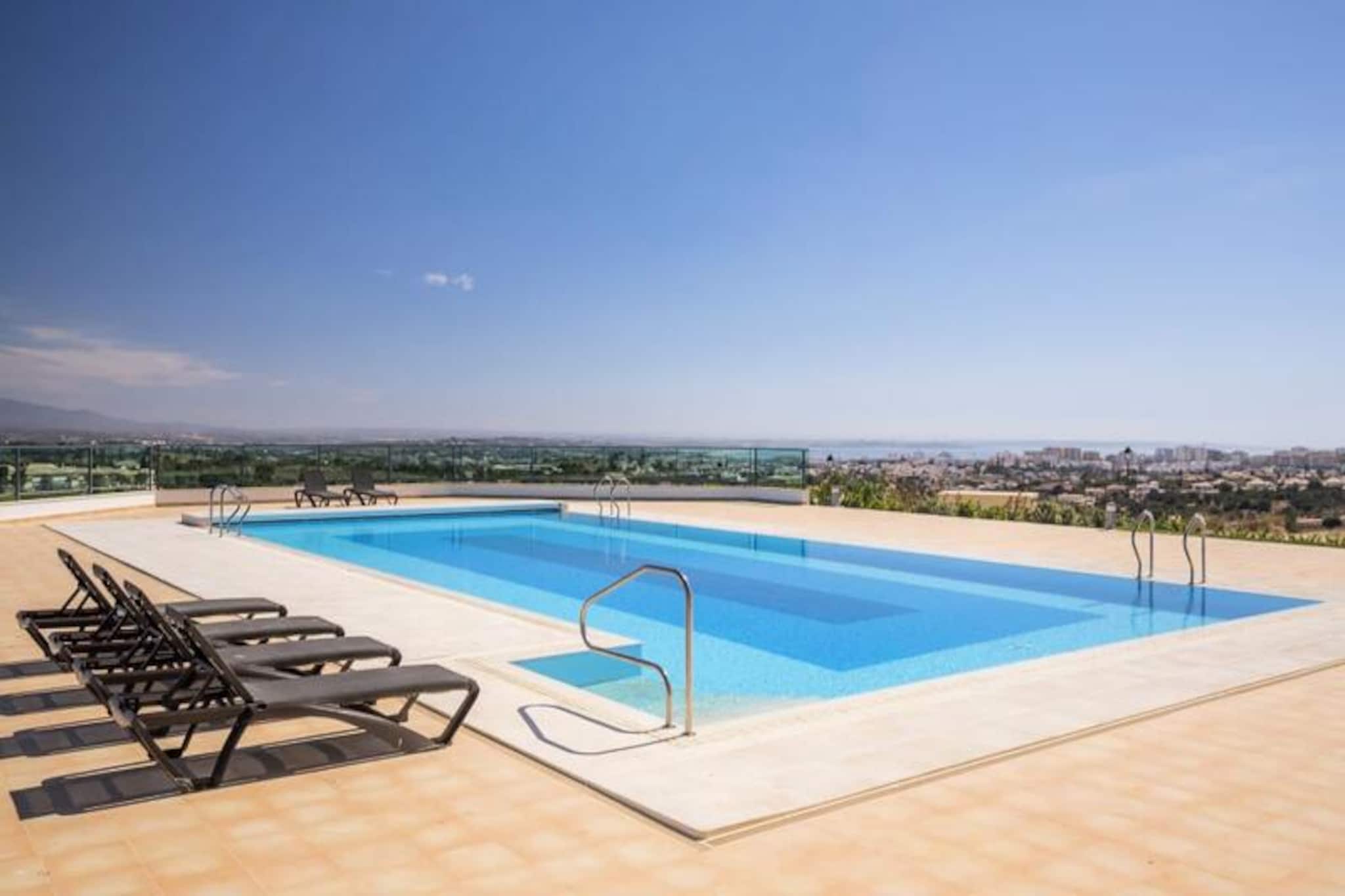 Immerse yourself in the serene beauty of the Algarve with this luxurious four-bedroom townhouse, nestled within the prestigious Boa Vista Resort in Lagos. Surrounded by lush landscapes and the vibrant energy of the region, this property offers an unparalleled blend of comfort, elegance, and convenience for your next getaway. Whether you're seeking relaxation or adventure, this is your perfect retreat. 
 
 Step into a modern haven where every detail has been thoughtfully designed. The spacious living room invites you to unwind with its contemporary furnishings and cozy ambiance, while the fully equipped kitchen inspires culinary creativity. Each of the four bedrooms is a tranquil escape, with three featuring en-suite bathrooms for added privacy. The private terrace and balcony provide the ideal setting for al fresco dining or a quiet evening under the Algarve's starlit skies. 
 
 Boa Vista Resort offers a wealth of world-class amenities to enhance your stay. Take a refreshing dip in the large swimming pool, challenge yourself on the 18-hole golf course, or rejuvenate at the health and fitness spa, complete with a heated indoor pool, jacuzzi, sauna, and steam room. For those seeking more active pursuits, tennis courts and an archery range are at your disposal. The resort's beautifully maintained grounds create a peaceful atmosphere, perfect for leisurely strolls. 
 
 Beyond the resort, the historic town of Lagos awaits with its charming streets, vibrant marina, and stunning cliffs. Explore the coastline by boat, kayak, or paddleboard, and indulge in the region's renowned cuisine. With Faro Airport just an hour away by car, this townhouse is your gateway to the best of the Algarve. Whether you're planning a family holiday or a romantic escape, this property promises an unforgettable experience.