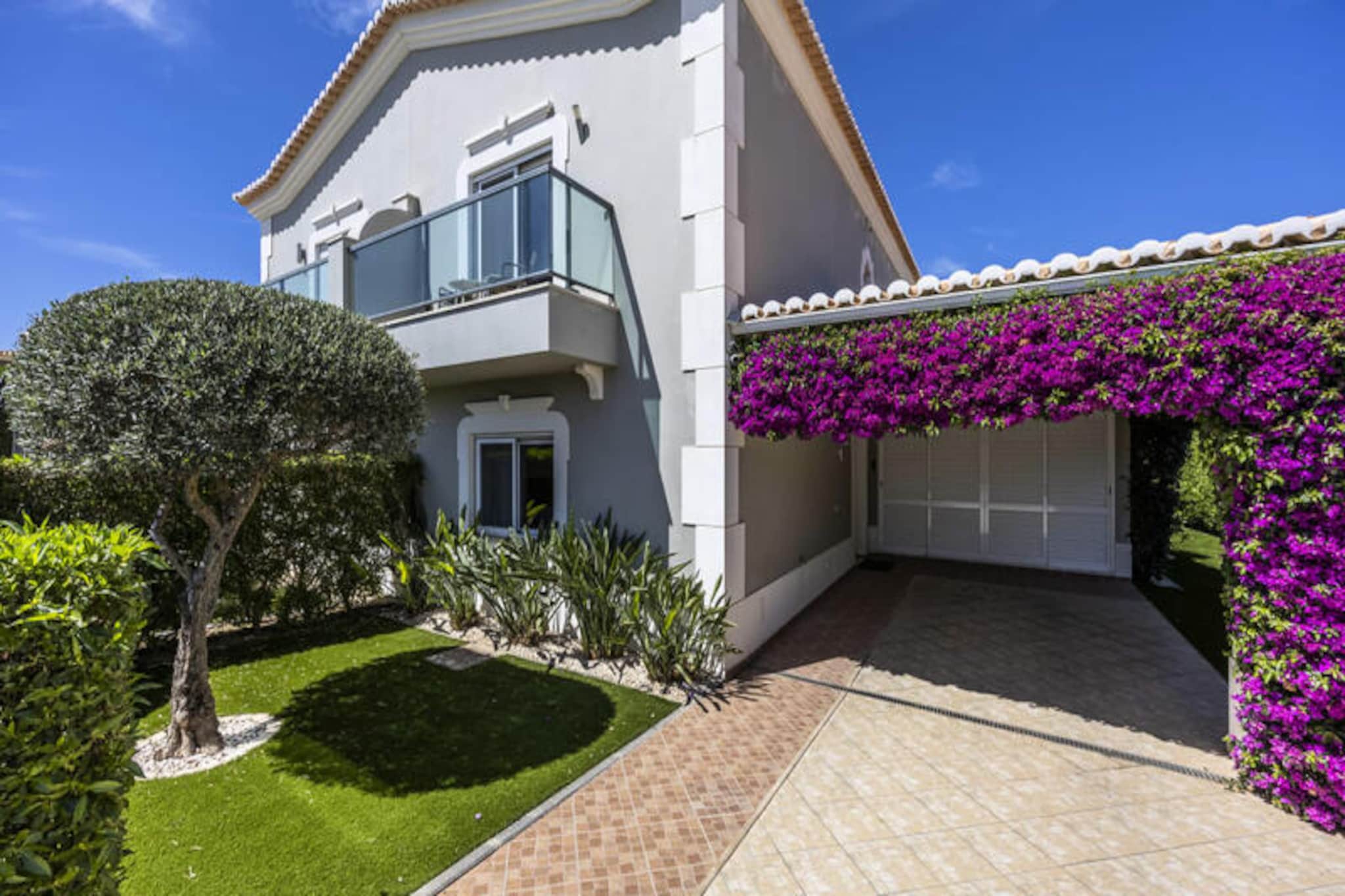 Escape to this stunning 3-bedroom villa in the heart of the prestigious Boavista Resort, Lagos, where modern luxury meets the serene beauty of the Algarve. With panoramic views of the lush golf course and rolling countryside, this property offers a tranquil retreat for families, friends, or couples seeking a memorable getaway. Imagine waking up to the golden hues of the Portuguese sun, sipping your morning coffee on the private terrace, and soaking in the peaceful surroundings. 
 
 Inside, the villa is bathed in natural light, creating a warm and inviting atmosphere. The spacious living room is perfect for unwinding after a day of adventure, while the fully equipped kitchen inspires culinary creativity. Each of the three bedrooms boasts its own en-suite bathroom, ensuring privacy and comfort for all guests. The villa’s thoughtful design seamlessly blends functionality with elegance, making it a true home away from home. 
 
 Step outside to your private garden and terrace, where you can bask in the sun or enjoy a leisurely evening under the stars. The shared outdoor pool is just a short stroll away, offering a refreshing escape on warm days. Golf enthusiasts will appreciate the challenging yet scenic Boavista Golf Course, while the resort’s spa and tennis facilities provide additional opportunities for relaxation and recreation. 
 
 Beyond the resort, Lagos awaits with its vibrant historic center, charming marina, and world-famous cliffs. Whether you’re exploring by boat, kayak, or paddleboard, the dramatic coastline is a sight to behold. With its rich culture, delicious cuisine, and endless activities, Lagos is the perfect destination for travelers of all ages. Make this villa your base for an unforgettable Algarve experience.