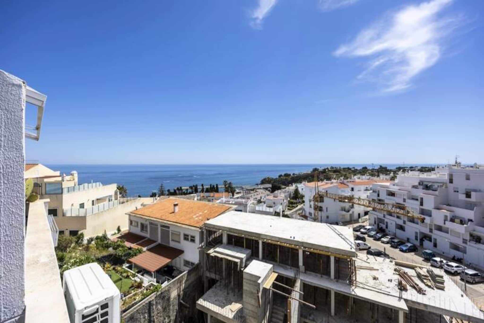 Wake up to the soothing sound of waves and the golden hues of the Algarve sunrise in this stunning one-bedroom apartment in Albufeira. Located on the third floor of the Edificio Oceano, this serene retreat offers breathtaking views of the Atlantic Ocean from every room, making it the perfect escape for couples, small families, or friends seeking a memorable beach getaway. Just steps away from the iconic Praia do Peneco, this apartment places you in the heart of Albufeira's Old Town, with its charming cobblestone streets, vibrant culture, and historic landmarks. 
 
 Inside, the apartment is designed for comfort and convenience. The spacious bedroom invites restful nights, while a cozy sofa bed in a separate room provides additional sleeping space. The fully equipped kitchen, complete with modern appliances including a washing machine and dryer, ensures you have everything you need for a hassle-free stay. The private balcony is the perfect spot to sip your morning coffee or unwind with a glass of wine as you take in the panoramic sea views. A well-appointed bathroom with a bathtub and shower adds to the comfort, while WiFi and TV keep you connected and entertained.
 
 Step outside, and you'll find yourself immersed in the lively atmosphere of Albufeira's Old Town. Explore the winding streets filled with local shops, restaurants, and bars, or take a short walk to the beach, accessible via elevator or steps. For those seeking adventure, the Algarve coastline offers a variety of activities, from boat tours to water sports. Family-friendly attractions like Zoomarine and nearby water parks are just a short drive away, while the local Giro bus provides easy access to the marina and beyond.
 
 Whether you're here to relax on the golden sands, explore the rich history of Albufeira, or embark on an adventure along the Algarve coast, this apartment offers the perfect base for an unforgettable holiday. Book your stay today and create memories that will last a lifetime.