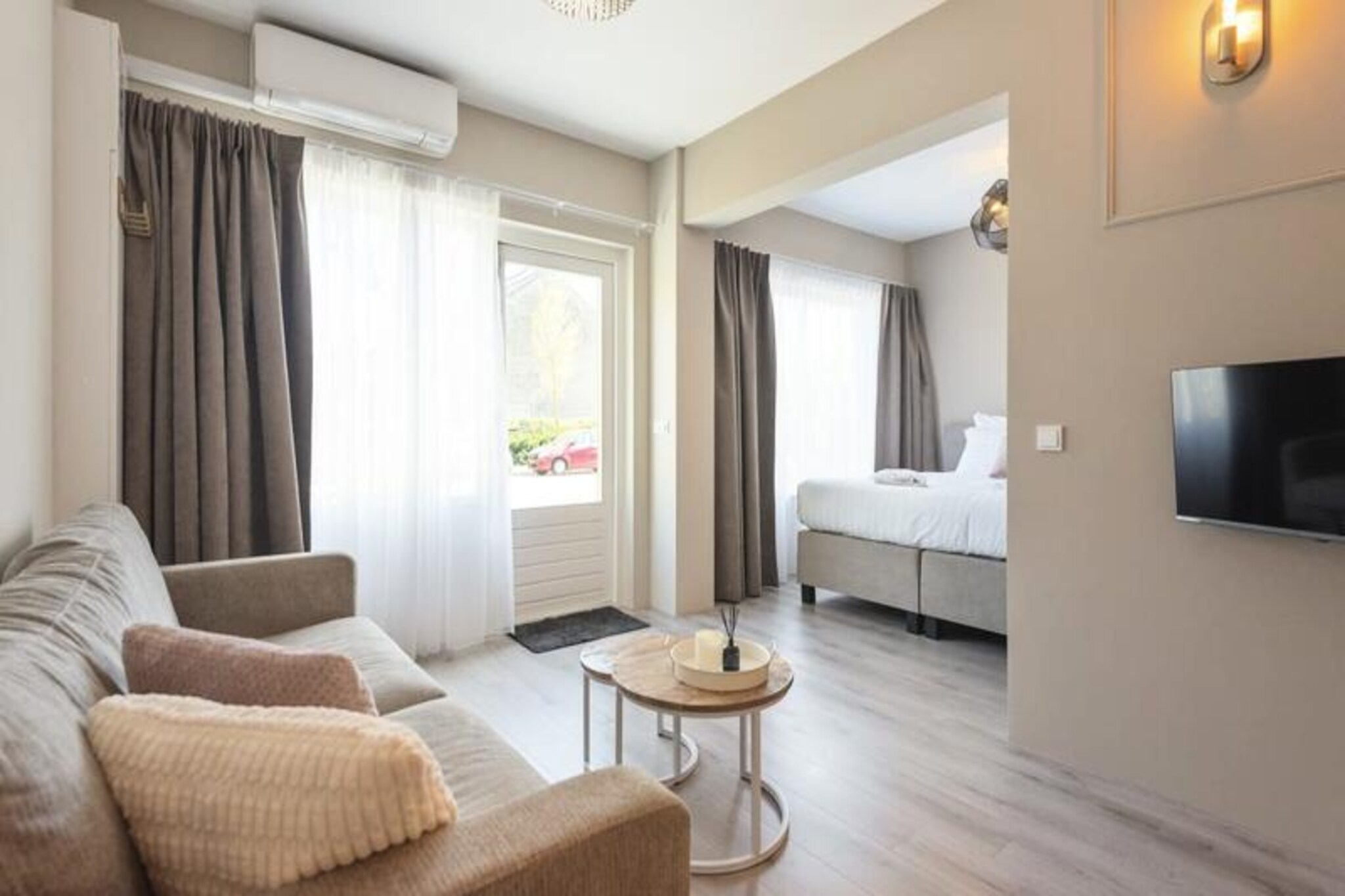 Where the golden dunes meet the serene waves of the North Sea, this modern studio in Zandvoort offers a tranquil retreat for two. With its soft sand-toned decor and natural accents, the space invites you to unwind and embrace the coastal charm of this picturesque Dutch town. Whether you’re seeking a romantic getaway or a peaceful escape, this studio sets the perfect tone for your holiday. \n\nInside, you’ll find a king-size bed that promises restful nights, a private bathroom with a shower, and a fully equipped kitchen to prepare your favorite meals. The cozy sitting area is ideal for relaxing after a day exploring the nearby beaches or cycling through the dunes. Step outside to your private patio, where a picnic table awaits for morning coffee or an evening glass of wine under the stars. With air conditioning, Wi-Fi, and television, every detail has been considered to ensure your comfort. \n\nThe studio’s location is unbeatable—just minutes from Zandvoort’s lively beach clubs, restaurants, and shops, yet tucked away in a quiet area for optimal relaxation. Nature enthusiasts will love the proximity to De Waterleidingduinen and Kennemerduinen national parks, perfect for hiking and cycling. For thrill-seekers, Circuit Park Zandvoort offers exciting motorsport events, while surfers can catch the waves or even earn their PADI certification. \n\nWith free private parking and excellent transport links to Amsterdam and Haarlem, this stylish studio is your gateway to discovering the best of the Dutch coast and city life. Whether you’re here to relax, explore, or indulge in adventure, this Zandvoort retreat promises unforgettable memories.