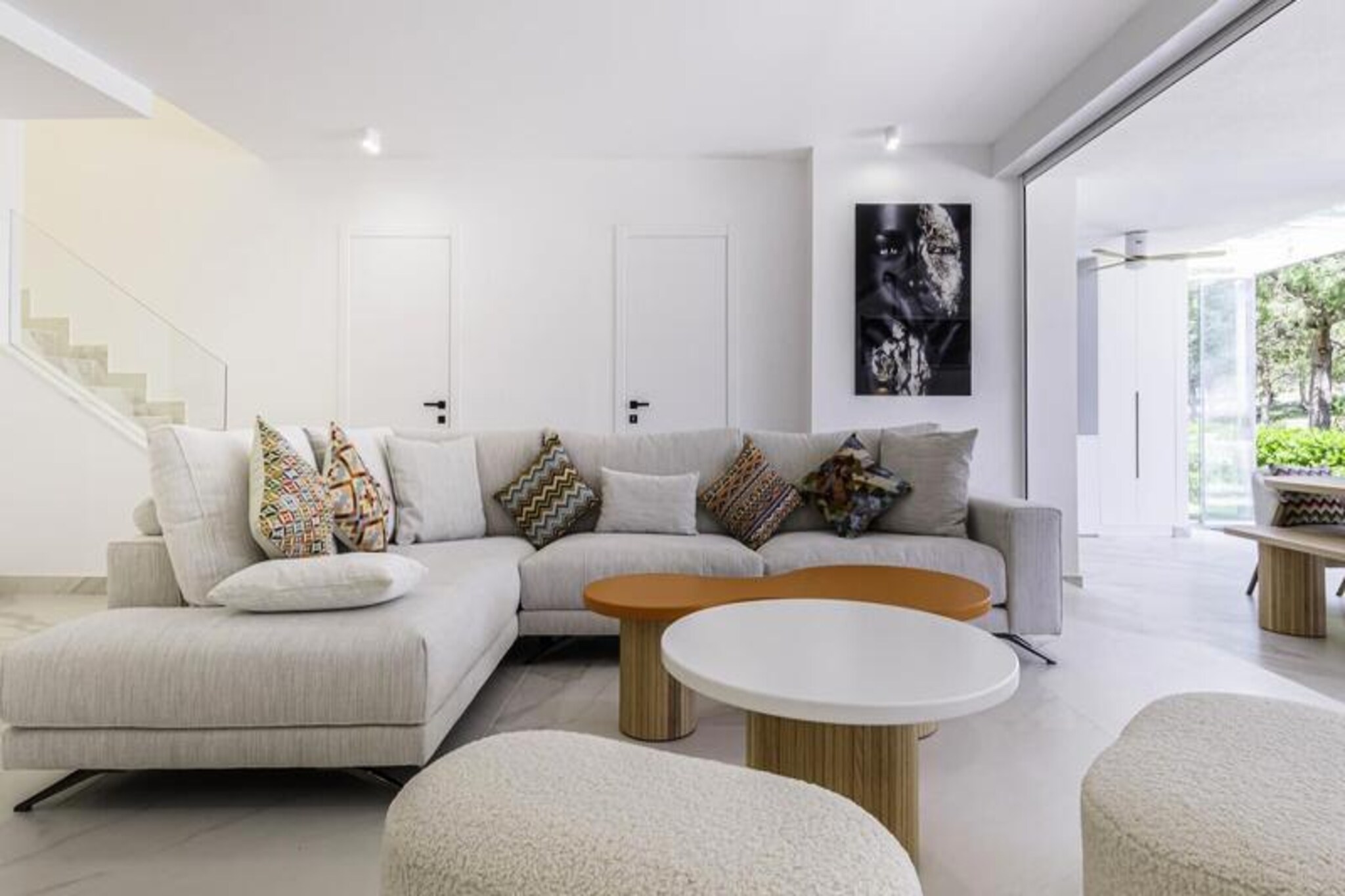 In the serene enclave of Santa Clara Golf, this luxurious 4-bedroom terraced house offers a perfect blend of modern elegance and Mediterranean charm. Situated in one of Marbella's most prestigious communities, the property is surrounded by lush greenery and boasts breathtaking views of the sea and mountains. Just minutes from Marbella's vibrant city center and the golden beaches of the Costa del Sol, this residence is an oasis of tranquility and sophistication. \n\nStep inside to discover a spacious open-plan living and dining area, adorned with designer furniture and a large Smart TV, perfect for unwinding after a day of exploration. The high-end kitchen, complete with a central island and top-tier appliances, invites culinary creativity. The ground floor also features an en-suite bedroom with direct terrace access, while the first floor hosts a luxurious master suite with a private terrace, alongside two additional bedrooms, each thoughtfully designed for comfort and style. \n\nBeyond the interiors, the property offers access to a shared outdoor swimming pool, surrounded by lush gardens, creating an idyllic setting for relaxation. With 24-hour security, high-speed Wi-Fi, and modern amenities such as central air conditioning and electric shutters, every detail has been considered to ensure a seamless stay. \n\nWhether you're a golf enthusiast, a family seeking a peaceful retreat, or a traveler eager to explore Marbella's vibrant culture, this property places you at the heart of it all. From the exclusive Santa Clara Golf course to the nearby beaches, restaurants, and iconic Puerto Banús, every moment here promises luxury and unforgettable memories. Book your stay today and indulge in the essence of the Costa del Sol.