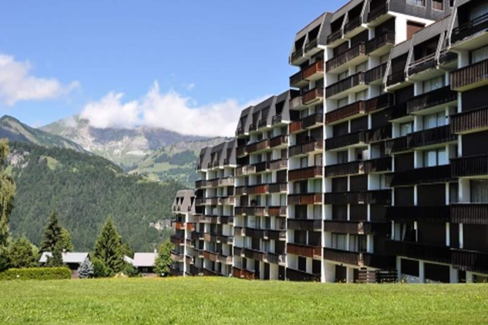 In the picturesque village of Notre Dame de Bellecombe, surrounded by the breathtaking peaks of the Alps, this cozy studio apartment offers a serene escape for couples or small families. From the south-facing balcony, enjoy uninterrupted views of Mont Charvin and the valley below, while the charming Savoyard atmosphere of the village invites you to immerse yourself in alpine life. Whether blanketed in snow or bathed in summer sunlight, this destination is a haven for nature lovers and adventure seekers alike.
The studio is thoughtfully designed to maximize comfort and functionality. The living room features a television and versatile sleeping arrangements, including a double sofa bed, a single sofa bed, and a single futon, all complemented by cozy duvets and blankets. The open-plan kitchen is equipped with essential appliances, making it easy to prepare meals after a day of exploration. A small bathtub in the bathroom adds a touch of relaxation, while the large bay window fills the space with natural light. Additional conveniences include a ski locker, elevator access, and unreserved outdoor parking.
Located at the foot of the Espace Diamant ski area, the residence provides unparalleled access to 192 km of interconnected slopes, catering to both beginners and seasoned skiers. In summer, the private heated swimming pool and tennis court offer perfect relaxation after hiking or mountain biking on the nearby trails. The Mont Rond chairlift, open three days a week, provides stunning views of Mont Blanc, while excursions to Megève, Chamonix, and Annecy are just a short drive away.
With its idyllic setting, modern amenities, and proximity to year-round activities, this studio is an ideal choice for creating unforgettable alpine memories.