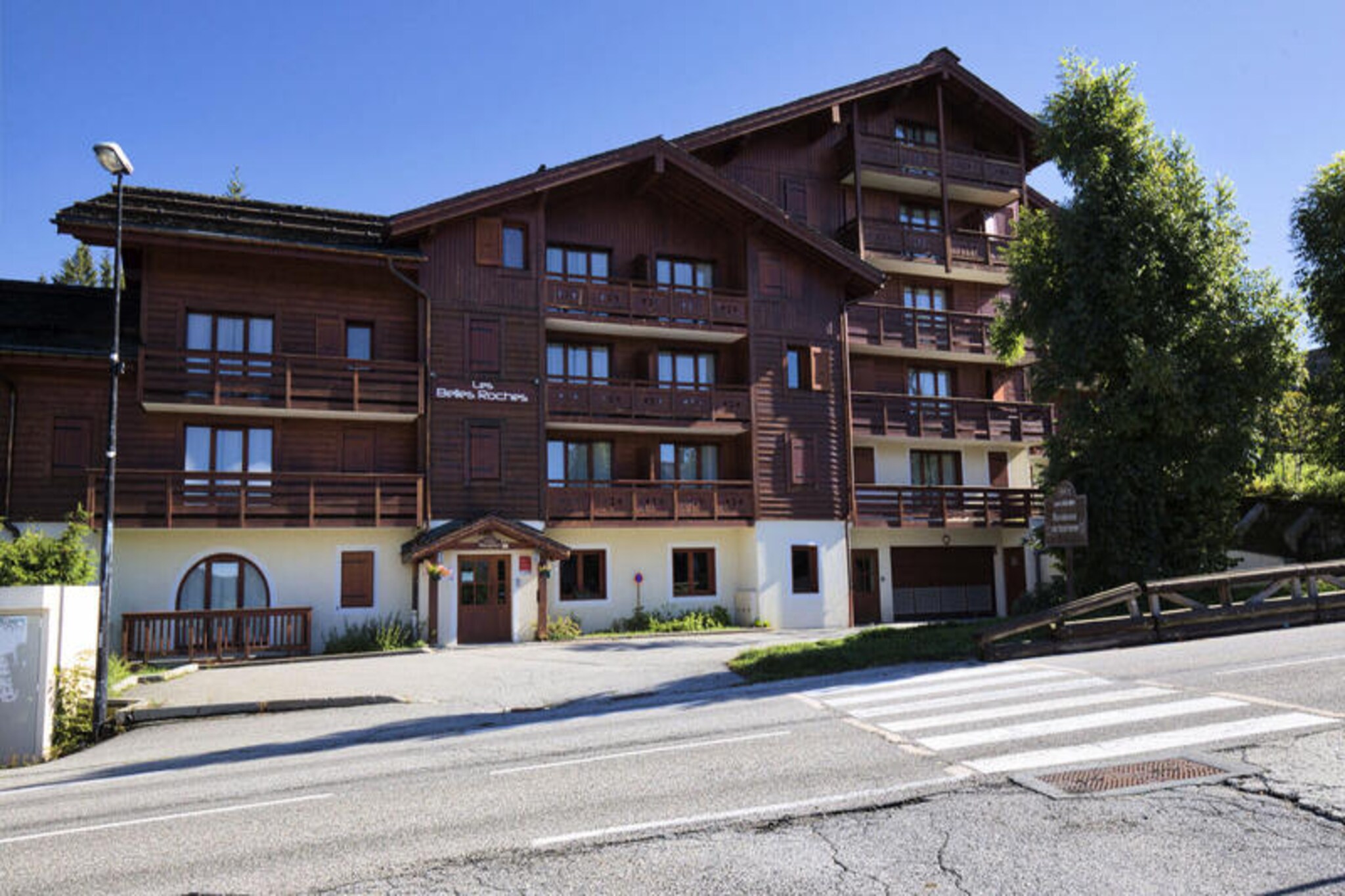 As the sun dips behind Mont Charvin, this delightful apartment offers an idyllic retreat in the heart of Notre Dame de Bellecombe. Perfectly situated in the charming village center, you’ll find yourself just steps away from local shops, restaurants, and activities, while the Espace Diamant ski area is a mere 400 meters away. Whether you’re seeking thrilling days on the slopes or tranquil evenings soaking in mountain views, this property delivers the best of alpine living. \n\nThe Belmont apartment is thoughtfully designed to accommodate up to six guests with a cozy living room featuring a pull-out sofa bed, a flat-screen TV, and an open-plan kitchen that leads to a balcony overlooking the majestic Mont Charvin. Two inviting bedrooms include an en-suite double room and a twin room, ensuring comfort and privacy for all. Modern amenities such as Wi-Fi, a ski locker, and private covered parking enhance your stay, while the residence’s indoor swimming pool and optional sauna provide a touch of luxury.\n\nBeyond the apartment, the village’s authenticity and warm atmosphere will captivate you. In winter, explore 192 km of interconnected slopes across six picturesque resorts, including Flumet and Les Saisies. Summer unveils a different charm with scenic hiking trails, mountain biking routes, and the Mont Rond chairlift offering breathtaking views of Mont Blanc. Families will love the nearby playground and Flumet lake, just 4 km away.\n\nWhether you’re here for snowy adventures or sunny escapes, this apartment promises unforgettable memories in the heart of the French Alps. Book your stay and experience the magic of Notre Dame de Bellecombe.