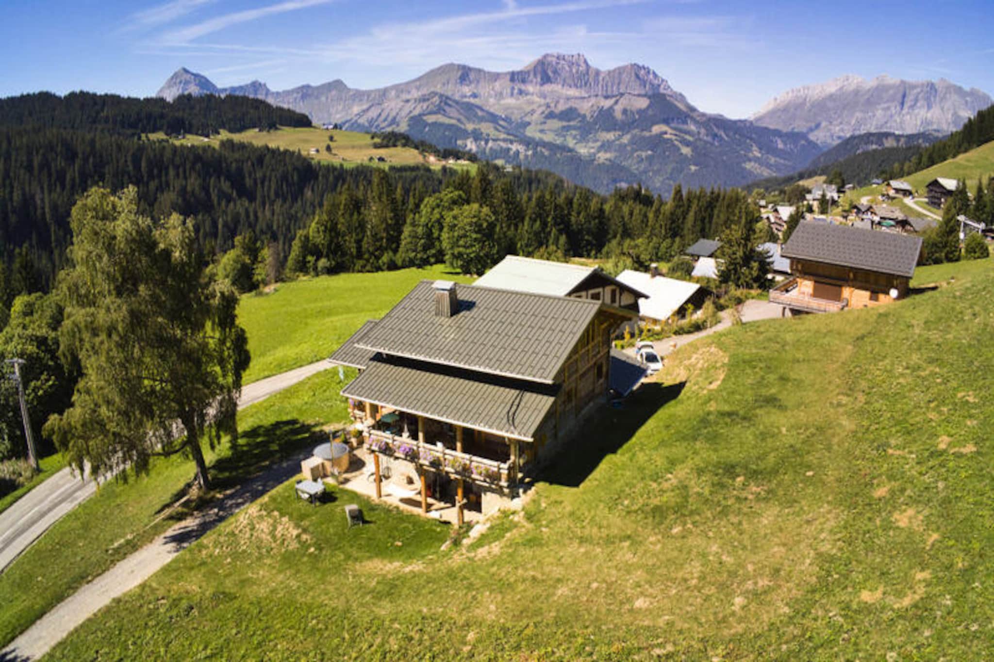 Amid the breathtaking scenery of the French Alps, Chalet La Chèle invites you to experience the perfect blend of modern comfort and alpine charm. Just 100 meters from the Boulangère ski lift, this chalet offers seamless ski-in/ski-out access to the renowned Espace Diamant ski area, boasting 192 kilometers of interconnected slopes across six picturesque village resorts. Whether you're an avid skier or simply seeking a serene mountain escape, this location caters to every desire. In summer, the chalet transforms into a gateway to lush trails and panoramic views of Mont Blanc, with the Mont Rond chairlift providing easy access to unforgettable vistas. \n\nSpanning 78 square meters, the apartment is thoughtfully designed for groups of six to eight guests. Its garden-level layout features a spacious south-west facing terrace, complete with garden furniture, where you can soak in views of Mont Charvin, Mont Bisanne, and the Aravis mountain range. Inside, the chalet boasts a fully equipped open-plan kitchen, a cozy ethanol fireplace, and modern amenities such as a flat-screen TV and PlayStation. The sleeping arrangements include an en-suite double bedroom, two additional double bedrooms, a twin room, and a bunk room, ensuring comfort for all. Two bathrooms, including a double shower, and two separate toilets add convenience to your stay. \n\nLocated in the sunny hamlet of Les Frasses, Notre Dame de Bellecombe, the chalet is ideally positioned for exploring the region. In winter, enjoy easy access to ski slopes and nearby villages like Flumet and Les Saisies. In summer, discover hiking trails, mountain biking routes, and the leisure center at Flumet Lake, just 9 kilometers away. The chalet also offers practical amenities such as a ski locker, parking, and baby equipment upon request. \n\nWith high-quality furnishings, tasteful decor, and exceptional service, Chalet La Chèle promises an unforgettable alpine retreat. Whether you're chasing powdery slopes or tranquil summer trails, this cozy haven is your perfect home away from home.