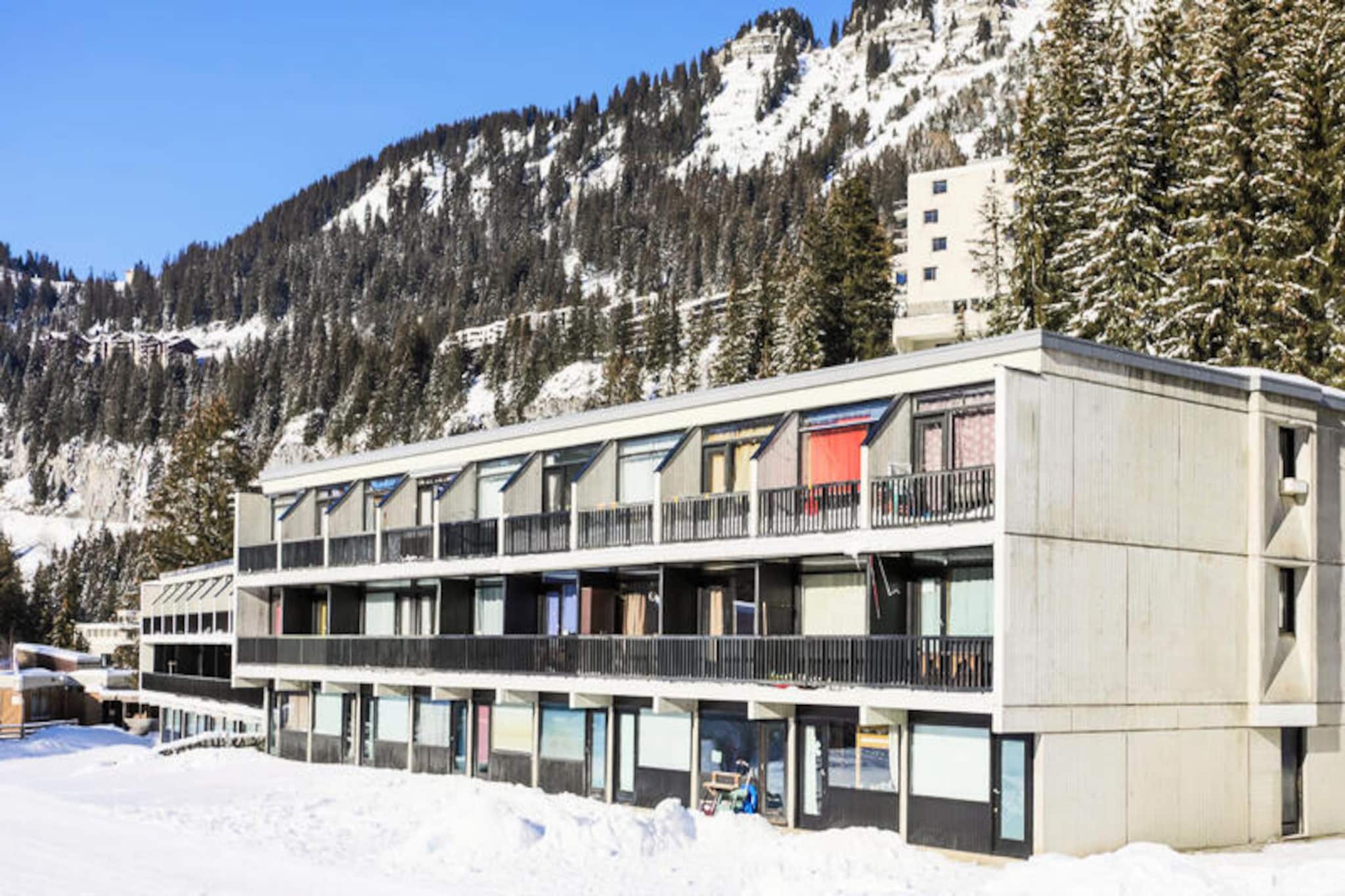 In the heart of the majestic French Alps, the Bellatrix Residence in Flaine invites you to a serene mountain retreat where adventure and tranquility coexist. With its prime location at the snow front, this ski-in/ski-out residence ensures you are just 75 meters from the first ski lifts, offering seamless access to the renowned Grand Massif ski area. Imagine starting your day with the crisp alpine air and ending it with the golden hues of the setting sun reflecting off the snowy peaks. This is a haven for ski enthusiasts and nature lovers alike. 
 
 The studio, designed for two, is compact yet thoughtfully arranged, featuring a cozy living area, a well-equipped kitchen, and a modern bathroom with a separate toilet. Its functional layout ensures a comfortable stay, whether you’re preparing a hearty breakfast before hitting the slopes or unwinding after a day of alpine adventures. The Maeva Home Comfort label guarantees quality and essential amenities, making it an excellent choice for travelers seeking value without compromising on comfort. 
 
 Beyond the residence, Flaine’s charm unfolds. A short walk along picturesque footpaths leads you to Flaine Forum, the vibrant heart of the resort. Here, you’ll discover a lively shopping arcade, inviting bars, and restaurants serving delectable regional specialties. Whether you’re exploring the slopes or enjoying the après-ski atmosphere, the resort’s energy is infectious. 
 
 Choose the Bellatrix Residence for its unbeatable location, warm ambiance, and the promise of unforgettable alpine memories. Whether it’s your first visit or a cherished tradition, Flaine offers a magical escape for all seasons.