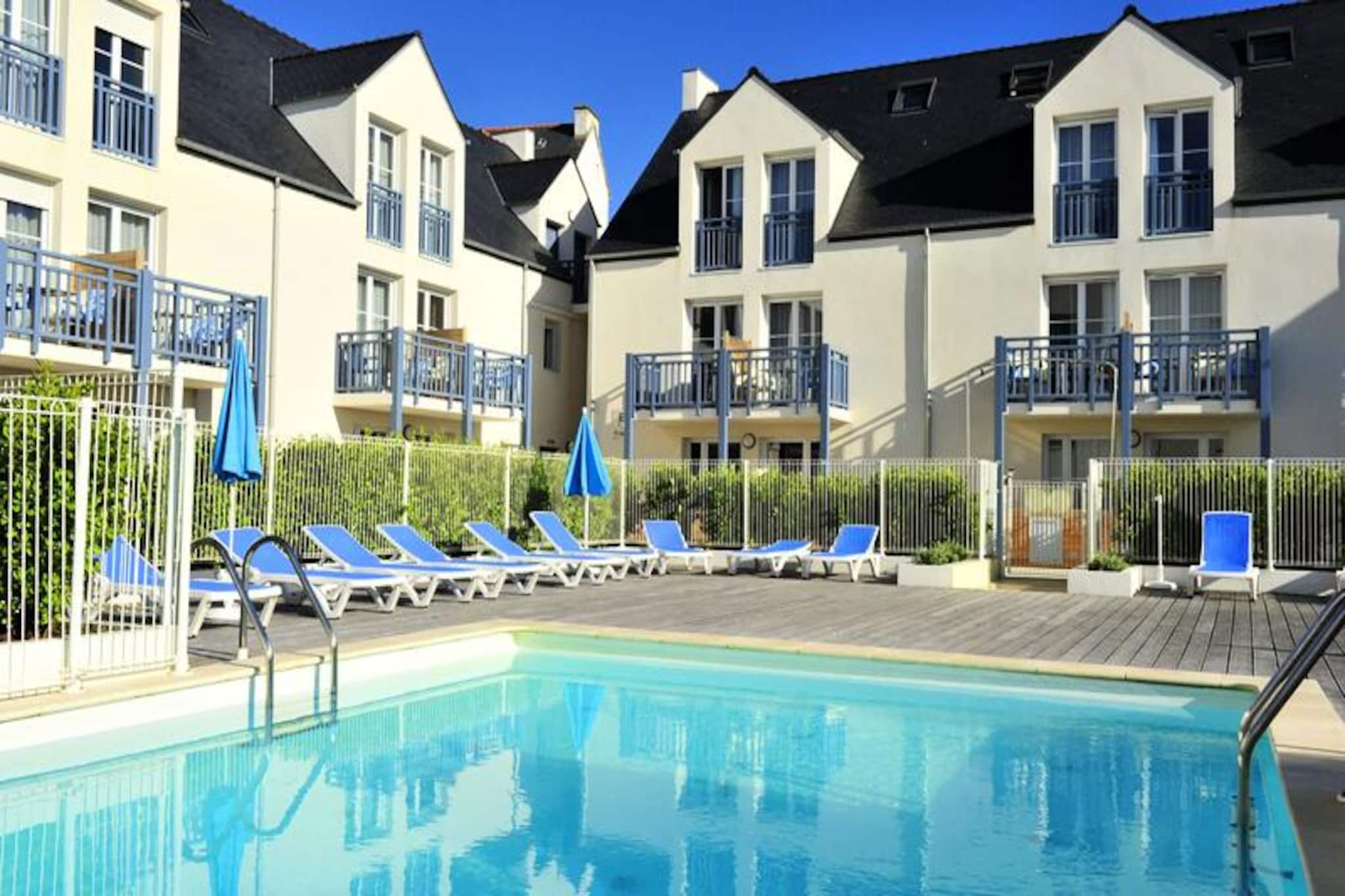 Where the Atlantic Ocean meets the charm of Brittany, the Goélia An Douar*** Residence in Audierne offers an idyllic escape just steps from Trescadec Beach. Imagine waking up to the sound of waves and the scent of sea air, with the largest stretch of fine sand in the area only 100 meters away. This beachfront retreat invites you to embrace the beauty of Finistère, whether you're seeking relaxation or adventure.
The residence boasts a heated outdoor swimming pool with breathtaking sea views, perfect for a refreshing dip or lounging on the furnished sun terrace. For ultimate relaxation, indulge in the wellness area featuring a sauna and hammam. Each apartment, ranging from 30 to 35 m², is thoughtfully designed with a cozy living room, a fully equipped kitchen, a bedroom with a double bed, and a private terrace to soak in the coastal atmosphere. Modern conveniences like Wi-Fi, television, and optional baby kits ensure a comfortable stay for families and couples alike.
Audierne itself is a gem of Brittany, known for its picturesque harbor, vibrant markets, and proximity to iconic sites like Pointe du Raz and Quimper. Stroll along the bay, explore the Cap-Sizun trails, or savor fresh seafood at local restaurants. With underground parking, pet-friendly options, and easy access to the region's highlights, this residence is the perfect base for discovering the magic of the Breton coast.
Whether you're here for the sun, sea, or the timeless charm of Brittany, the Goélia An Douar*** Residence promises unforgettable moments by the ocean.