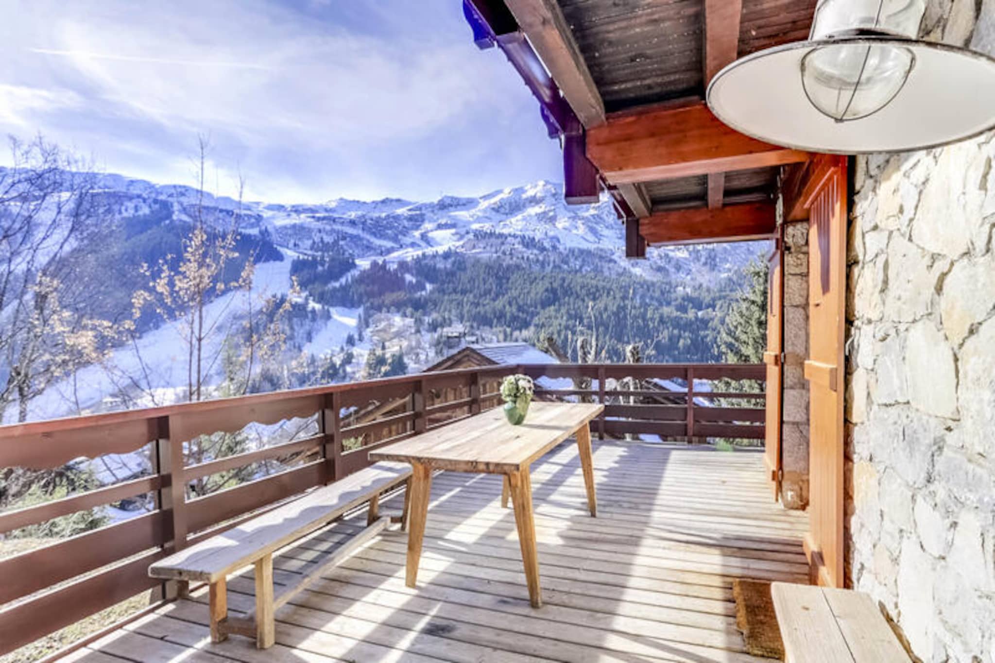 Amidst the serene charm of Méribel’s Route de la Renarde, this elegant duplex apartment offers an unparalleled alpine retreat. Imagine waking up to the soft glow of sunlight streaming across snow-dusted slopes, stepping onto your southwest-facing terrace, and breathing in the crisp mountain air before heading straight onto the pistes. Perfectly positioned for ski-in/ski-out convenience, this residence combines tranquility with easy access to Méribel’s vibrant village life and essential amenities. Whether you’re here to carve through powder or explore the beauty of the French Alps, this property sets the stage for unforgettable moments. \n\nSpanning 95m² across two floors, the apartment accommodates up to eight guests in four thoughtfully designed bedrooms. Each room offers flexible sleeping arrangements, with beds that can be converted into doubles, ensuring comfort for families or groups. Two en-suite bathrooms, a separate bathroom on each floor, and four toilets provide ample facilities for all. The fully equipped kitchen invites you to prepare hearty meals after a day of adventure, while the cozy living area with a fireplace and 40-inch TV creates the perfect setting to unwind. Additional amenities include WiFi, a heated ski room, and a private parking space, ensuring every detail of your stay is seamless. \n\nLocated directly on the slopes, the residence is also just moments from local shops, ski rentals, and restaurants, making it an ideal base for both winter and summer escapes. Méribel’s renowned ski domain offers endless opportunities for exploration, while summer visitors can enjoy hiking trails, mountain biking, and the breathtaking scenery of the Alps. With the charm of Route de la Renarde and the convenience of modern comforts, this apartment is your gateway to alpine bliss. \n\nWhether you seek thrilling adventures or serene relaxation, this Méribel duplex promises a holiday filled with cherished memories and the timeless allure of the mountains.