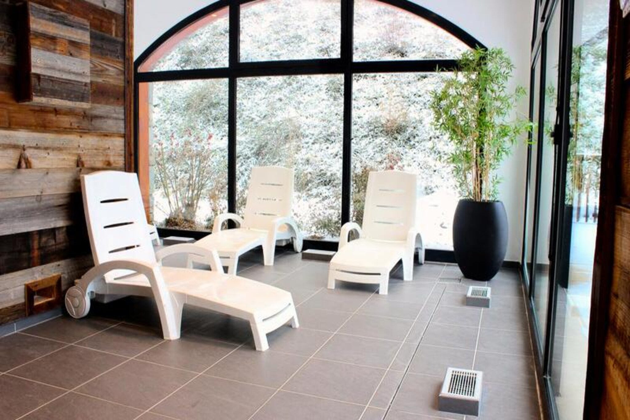 Surrounded by the majestic peaks of the Haute Maurienne Valley, Résidence Les Alpages de Val Cenis**** offers a serene alpine retreat with breathtaking views of the Vanoise National Park. Here, nature’s beauty unfolds in every direction, creating an idyllic setting for your next mountain escape. Whether you’re seeking adventure or tranquility, this residence promises an unforgettable stay amidst the charm of the French Alps. \n\nThe property features five Savoyard-style chalets, blending traditional architecture with modern comforts. Each apartment accommodates between two and eight guests, making it ideal for families or groups. Thoughtfully designed interiors include cozy living spaces, fully equipped kitchens, and private balconies or terraces to soak in the stunning surroundings. Guests enjoy access to premium amenities such as a heated outdoor pool, sauna, hammam, jacuzzi, and fitness room, ensuring relaxation after a day of alpine exploration. Ski lockers, elevators, and covered parking add convenience to your stay. \n\nLocated just 100 meters from the Pré Novel cable car, the residence provides effortless access to the slopes of Lanslebourg and Lanslevillard ski resorts. Shuttle buses further enhance connectivity, while nearby trails and panoramic viewpoints invite summer visitors to explore the region’s natural wonders. Dining options, local shops, and cultural attractions are all within easy reach, offering a taste of authentic Savoyard life. \n\nWhether you’re carving through pristine snow or hiking amidst vibrant summer landscapes, Résidence Les Alpages de Val Cenis**** is your gateway to the best of the Haute Maurienne Valley. Let the timeless allure of the Alps inspire your next adventure.