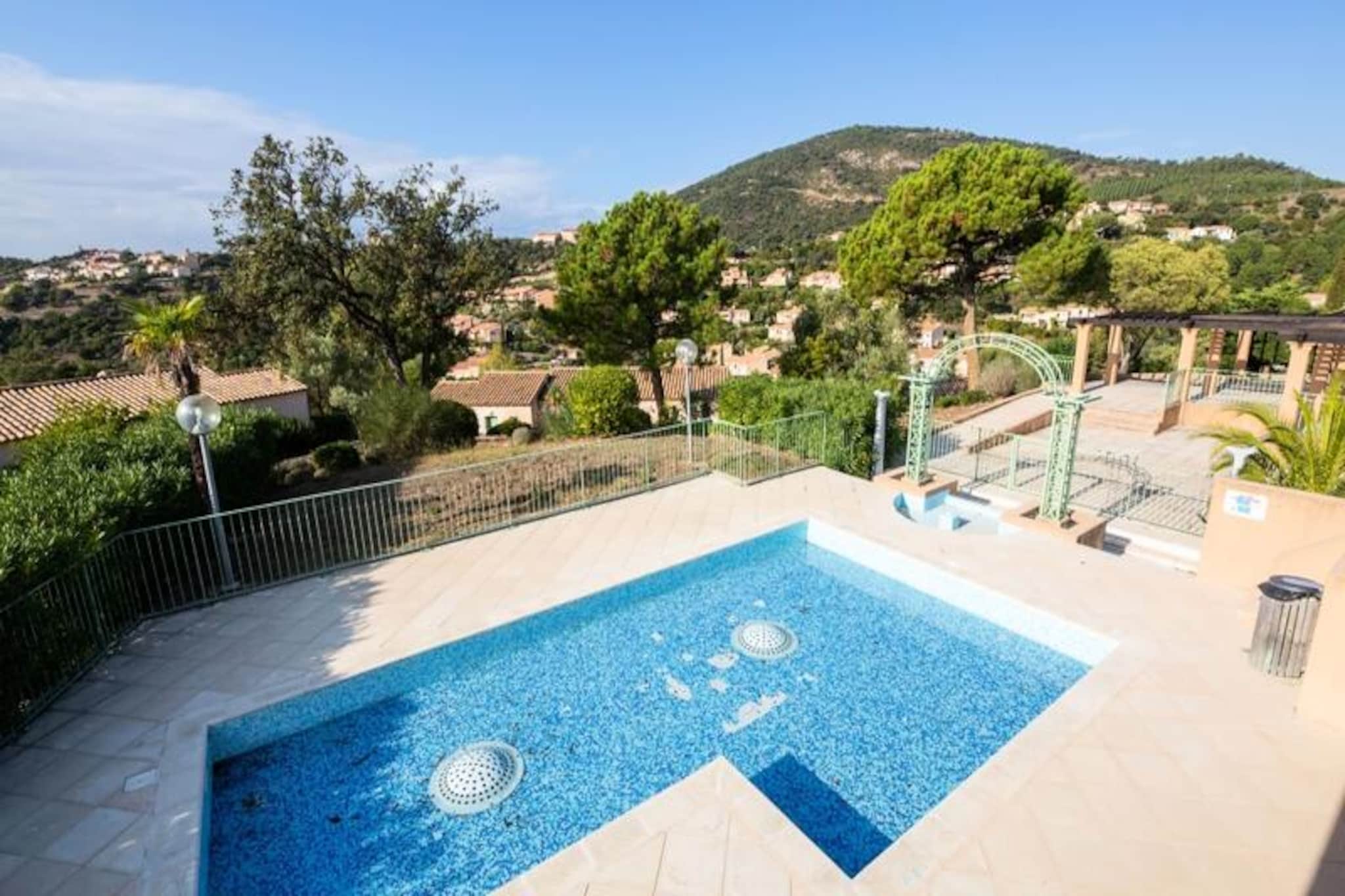 Perched on the scenic heights of Les Issambres, this charming two-room apartment offers a serene escape with breathtaking panoramic views of the Gulf of St. Tropez and the surrounding verdant hills. Imagine waking up to the gentle Mediterranean breeze and the sparkling seafront, a perfect backdrop for your holiday retreat. Whether you’re seeking relaxation or adventure, this location promises an unforgettable experience.
The apartment, thoughtfully designed to accommodate up to five guests, features a cozy living room, a well-equipped kitchenette, a comfortable bedroom, a sleeping alcove, and a modern bathroom. Its tasteful decor and quality amenities ensure a relaxing and enjoyable stay. As part of the Domaine des Issambres, guests have complimentary access to a stunning 330 m² swimming pool, open from May 10th to September 30th, 2025. The pool, framed by elegant railings, is the ideal spot to soak up the sun or cool off after a day of exploring.
Les Issambres is perfectly situated for discovering the charm of the French Riviera. Stroll along the pristine beaches, indulge in local Provençal cuisine at nearby restaurants, or venture to the vibrant towns of St. Tropez and Sainte-Maxime. For nature enthusiasts, the hills surrounding the Gulf offer picturesque hiking trails and breathtaking vistas.
Whether you’re traveling with family or friends, this private rental combines comfort, convenience, and the allure of the Côte d’Azur, making it the perfect choice for your next getaway.