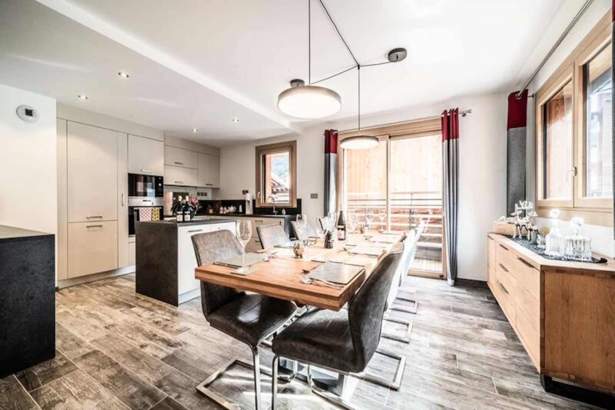 In the heart of Morzine, where alpine charm meets modern luxury, this exceptional 4-bedroom apartment offers an unparalleled mountain retreat. Just steps from the Pleney slopes and gondola, it places you at the center of one of the most vibrant ski destinations in the French Alps. Imagine waking up to the crisp mountain air, stepping onto your private terrace overlooking the lively streets below, and heading out for a day of adventure in the snow-covered peaks. Whether you're here for skiing, snowboarding, or simply to soak in the alpine atmosphere, this property promises an unforgettable stay.
Spanning a generous 126m², this high-end apartment comfortably accommodates up to eight guests. The open-plan living and dining area, complete with a fully equipped kitchen, is perfect for gathering after a day on the slopes. Each of the four bedrooms is thoughtfully designed for comfort, with two offering balcony access and en-suite bathrooms for added privacy. A cozy sleeping alcove with a bunk bed is ideal for younger guests, while the ski locker with a boot dryer ensures your gear is ready for the next day's adventures. Modern amenities, including Wi-Fi and a private parking space with a garage, make your stay as convenient as it is luxurious.
Located less than 100 meters from the Pleney gondola and the renowned ESF ski school, this apartment is a dream for winter sports enthusiasts. Beyond the slopes, Morzine's charming village offers a delightful mix of traditional Savoyard culture, bustling markets, and gourmet dining. In the warmer months, the region transforms into a haven for hikers and cyclists, with trails that wind through breathtaking alpine landscapes.
Whether you're seeking thrilling outdoor activities or a peaceful mountain escape, this stunning property in Morzine is the perfect base for your next alpine adventure. Book your stay now and create memories that will last a lifetime.