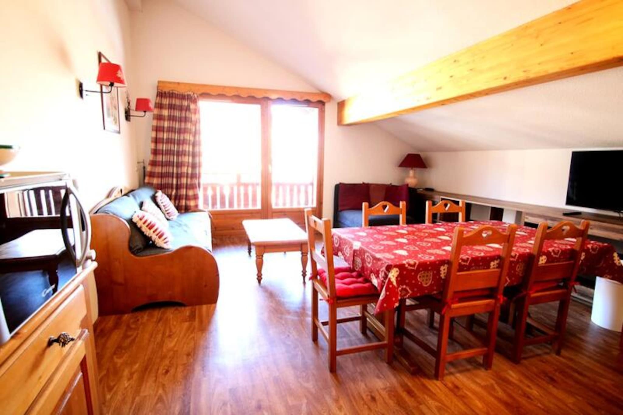 High above the serene slopes of Puy Saint Vincent 1800, this charming apartment invites you to experience a mountain retreat like no other. With breathtaking views from your private balcony and direct access to the ski slopes, every moment here feels like a celebration of alpine beauty. Whether you're seeking thrilling winter adventures or tranquil summer escapes, this property offers the perfect base for your holiday. Imagine sipping your morning coffee as the sun rises over the peaks, or unwinding after a day of exploration in the heated outdoor pool during the warmer months. \n\nDesigned to accommodate up to five guests, the apartment features a cozy living room with a pull-out sofa bed, a convertible armchair, and a smart TV for entertainment. The well-equipped kitchen boasts modern appliances such as a microwave, dishwasher, and Senseo coffee machine, making it easy to prepare meals and snacks. A separate bedroom with a comfortable double bed ensures restful nights, while the bathroom with a heated towel rail adds a touch of luxury. Free WiFi keeps you connected, and thoughtful extras like linen and towel rental options make your stay hassle-free.\n\nThe residence itself is a hub of convenience, with a restaurant, snack bar, bakery, and ski rental shop right at your doorstep. In summer, the heated outdoor pool becomes a refreshing oasis, while the sauna offers relaxation year-round. Nearby, you'll find picturesque hiking trails, cycling routes, and stunning vistas that showcase the natural beauty of the Hautes-Alpes region. For families, couples, or small groups, this apartment is an ideal choice for creating unforgettable memories in the French Alps.\n\nWhether you're here to ski, hike, or simply soak in the mountain atmosphere, this residence combines comfort, convenience, and charm in one unforgettable package.