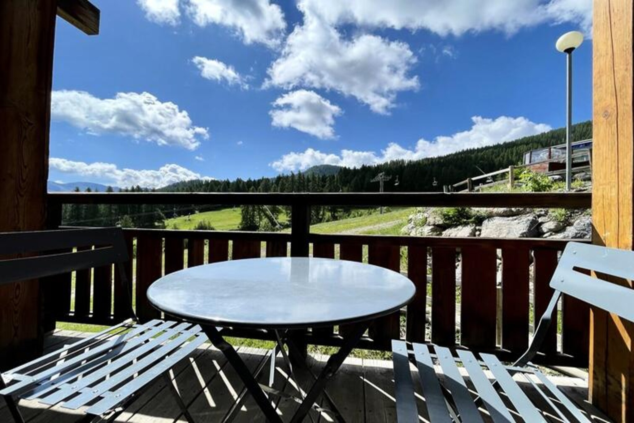 Perched high in the serene alpine village of Puy Saint Vincent 1800, this inviting apartment offers a blend of comfort and convenience for your mountain getaway. Imagine waking up to crisp mountain air and stepping out onto your private balcony to take in the breathtaking views of the surrounding peaks. Whether you’re here to ski the pristine slopes or explore the lush summer trails, this property is your gateway to unforgettable alpine adventures. \n\nThe apartment is thoughtfully designed to accommodate up to six guests, featuring two cozy bedrooms with brand-new mattresses, a spacious living area with a pull-out sofa bed, and a fully equipped kitchen complete with modern appliances like a microwave, dishwasher, and ceramic hob. The en-suite shower room and separate bathroom ensure privacy and ease for families or groups, while the heated towel rail adds a touch of luxury after a day in the mountains. Relax in the living room with a flat-screen TV or enjoy a meal on the balcony furnished with a table and chairs, perfect for soaking in the tranquil surroundings. \n\nLocated within the La Dame Blanche residence, guests benefit from direct access to the ski slopes, making it effortless to hit the powdery trails. On-site amenities include a heated outdoor pool open during summer months, a sauna for ultimate relaxation, and a coin-operated laundromat for added convenience. The residence also boasts a restaurant, snack bar, and bakery at its base, alongside a ski rental shop to ensure you’re fully equipped for your adventures. \n\nWhether you’re drawn to the thrill of winter sports or the charm of alpine summers, this property offers everything you need for a memorable stay. With free WiFi, nearby essential facilities, and the majestic peaks of the Hautes-Alpes as your backdrop, your mountain retreat awaits.