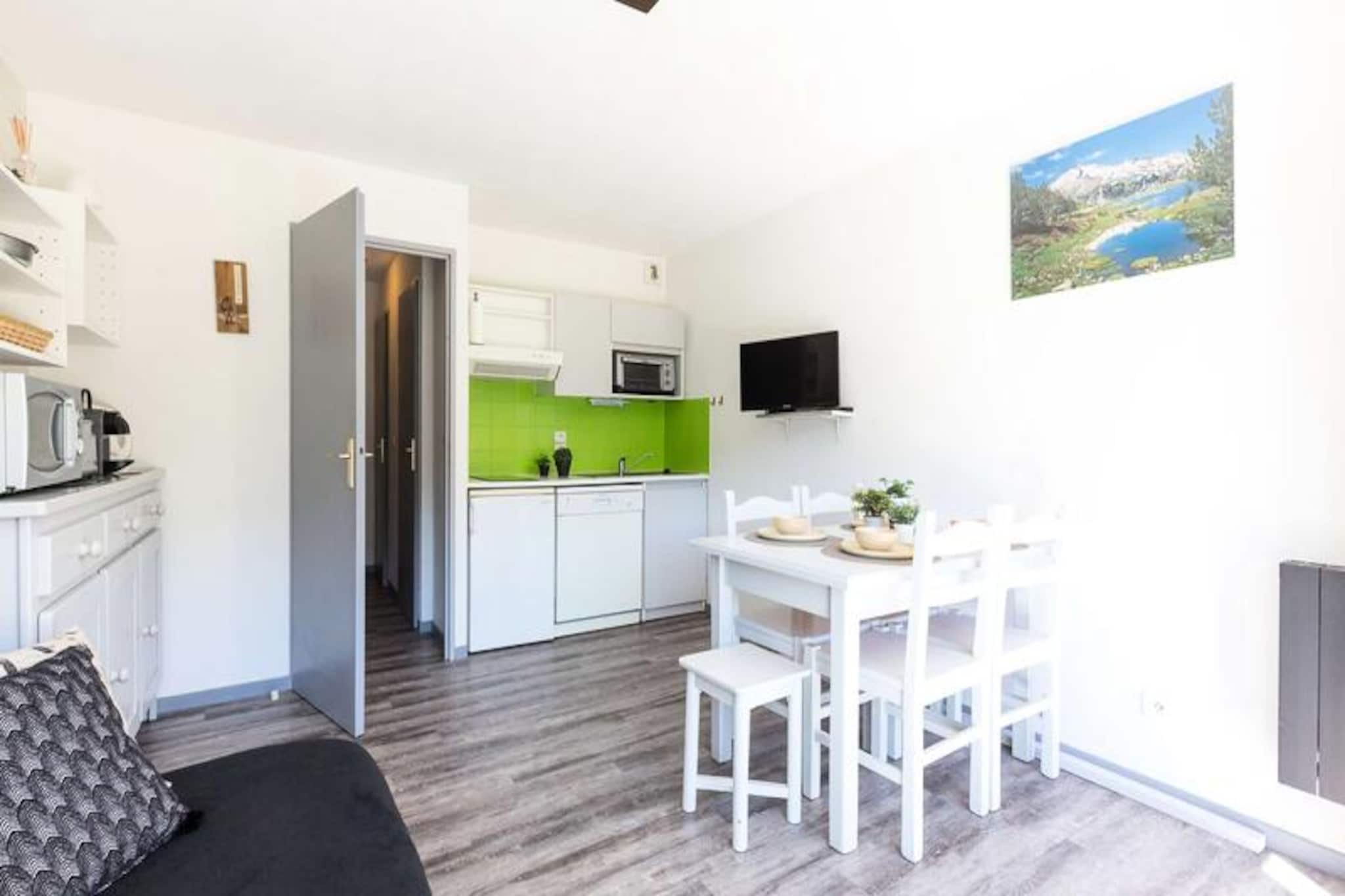 High above the serene valley of Saint-Lary, this charming apartment in the 'Le Village des Thermes' residence offers a tranquil retreat surrounded by the majestic Pyrenees mountains. Imagine waking up to the soft glow of the morning sun on your east-facing terrace, with uninterrupted views of snow-capped peaks and lush alpine landscapes. Whether you're seeking adventure or relaxation, this property is perfectly positioned to let you embrace the beauty of the region. \n\nDesigned for up to six guests, the apartment combines comfort and practicality. The open-plan kitchen and living area create a welcoming space for shared meals and cozy evenings, with a sofa bed providing additional sleeping arrangements. The master bedroom features a comfortable double bed, while the sleeping alcove offers bunk beds ideal for children or friends. A modern bathroom and separate WC ensure convenience, while the outdoor parking and ski locker make it easy to transition from your accommodation to the slopes. WiFi is included, keeping you connected throughout your stay. \n\nLocated just steps from the gondola lift and the renowned thermal baths of Saint-Lary, this apartment is a gateway to both relaxation and adventure. Spend your days skiing, snowshoeing, or exploring the pristine trails, then unwind in the soothing waters of the thermal baths. The nearby village offers charming shops, restaurants, and local specialties to complete your experience. \n\nWhether you're here for the thrill of the mountains or the peaceful ambiance of the Pyrenees, this apartment provides the perfect base for unforgettable memories. Let the breathtaking scenery and warm hospitality of Saint-Lary welcome you to a holiday you'll cherish forever.