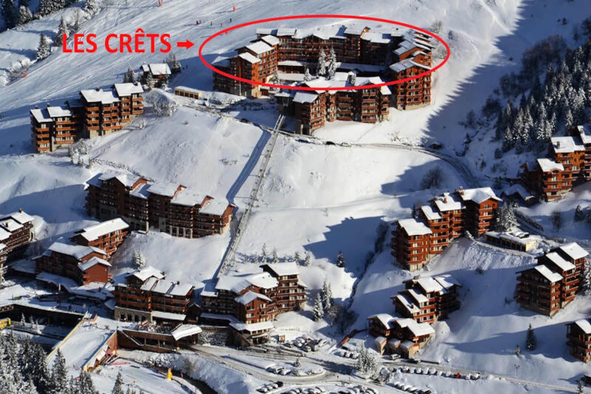 In the heart of the French Alps, where snow-dusted peaks meet serene alpine charm, this exceptional duplex apartment in the prestigious Les Crêts residence offers an unforgettable mountain escape. With its prime ski-in/ski-out location, you can step directly onto the Aigle red run and glide effortlessly to the main lift departure point, immersing yourself in the world-class slopes of Méribel. The south-west facing balcony invites you to soak in breathtaking views of the Platières while basking in the warmth of the alpine sun. \n\nSpanning an impressive 127m², this 5-room apartment is thoughtfully designed to accommodate up to 8 adults and 2 children. The main floor boasts a spacious and luminous living area with plush sofas and a dining space that frames the stunning mountain vistas. The open-plan kitchen is a chef’s delight, equipped with modern appliances including two ovens, an American-style refrigerator, and specialty items like raclette grills and a fondue set for cozy evenings. Four elegantly appointed bedrooms, including two with en suite bathrooms, ensure restful nights, while the mezzanine offers a quiet desk area. For ultimate relaxation, indulge in the private two-person sauna or unwind on the balcony with sun loungers. \n\nConveniently located, the residence provides easy access to the Châtelet shopping center via an inclined elevator just 50 meters away or a short 700-meter walk. The Chalets cable car connects you to the nearby Hameau and Laitelet districts with free access until late evening. Additional amenities include two ski lockers with boot dryers, indoor parking for two vehicles, and thoughtful extras like beds made upon arrival, bath towels, and end-of-stay cleaning. \n\nWhether you’re carving through pristine slopes, exploring charming alpine villages, or simply savoring the tranquility of the mountains, this Méribel Label apartment promises a luxurious retreat for families and friends. Pets are welcome, making it a perfect choice for creating cherished memories in the heart of the Alps.