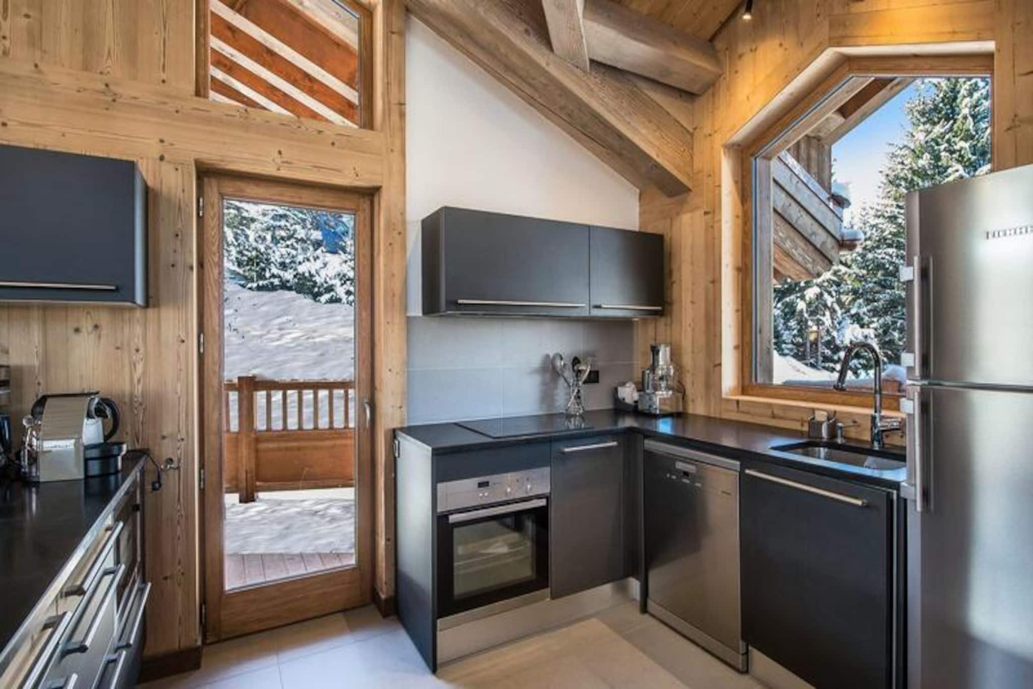 High above the picturesque Courchevel village, this luxurious chalet offers a serene retreat with breathtaking views of the surrounding glacier. Designed to combine alpine charm with modern elegance, the property is a haven for those seeking tranquility amidst the French Alps. The expansive bay windows in the living room flood the space with natural light, framing panoramic vistas that will leave you in awe. Whether you're relaxing by the wood-burning stove or enjoying the fresh mountain air, every moment here feels like a dream.
Spanning approximately 200m², the chalet is thoughtfully designed to accommodate up to 10 guests, making it perfect for families or groups of friends. With four beautifully appointed bedrooms, including a family room with twin beds and a bunk bed, everyone will find their own cozy corner. The open-plan kitchen is fully equipped, while the dining area invites you to share meals and create lasting memories. For ultimate relaxation, the basement features a private wellness area with a jacuzzi, sauna, and shower, ensuring your après-ski experience is nothing short of indulgent.
Situated in the peaceful Brigues district, the chalet is conveniently close to the slopes, offering easy access to world-class skiing. After a day on the mountain, unwind in the sauna or sip champagne as part of the exclusive winter services included with your stay. With a ski room, garage, and thoughtful amenities like mid-stay cleaning, bathrobes, and slippers, every detail has been considered to ensure your comfort.
Whether you're drawn by the allure of Courchevel's pristine slopes or the promise of a tranquil alpine escape, this chalet delivers an unforgettable experience. From its stunning glacier views to its luxurious amenities, it’s the perfect base for your next mountain adventure.