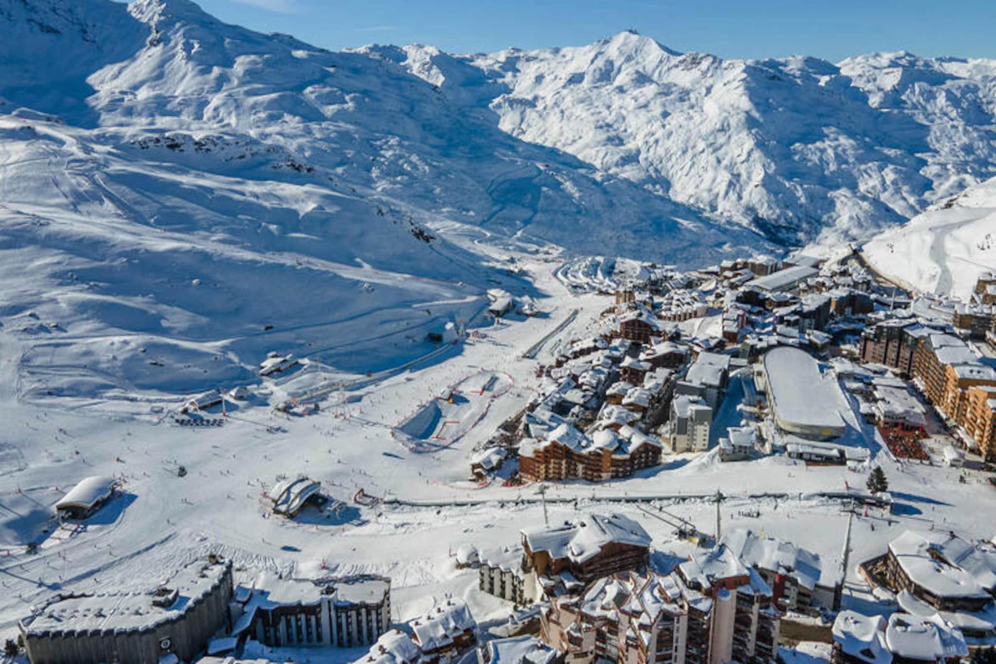 High above the breathtaking peaks of Val Thorens, this charming 42 m² apartment offers a cozy alpine retreat for up to six guests. Situated on the fifth floor of the Hauts de Chavière residence, it boasts stunning mountain views and an unbeatable location just steps from the ski slopes and resort center. Imagine waking up to the crisp mountain air, sipping coffee on your private balcony, and heading out for a day of adventure in one of the world’s most renowned ski destinations. Whether you’re here to carve through fresh powder or explore the vibrant village life, this apartment places you at the heart of it all. \n\nInside, the apartment is thoughtfully designed for comfort and convenience. The open-plan living room features a sofa bed, perfect for relaxing after a day on the slopes, while the fully equipped kitchen invites you to prepare hearty meals. A cozy bedroom with a double bed, an alcove with bunk beds, and a modern bathroom with a shower ensure restful nights and easy mornings. Additional amenities include Wi-Fi, linens, and bathroom toiletries, with beds made upon arrival for a seamless start to your stay. \n\nThe Hauts de Chavière residence is ideally located near shops, restaurants, and ski lift departure points, making it easy to access everything Val Thorens has to offer. From après-ski hotspots to local markets, you’ll find plenty to explore just a short stroll away. In summer, the area transforms into a haven for hikers and mountain bikers, with trails that wind through lush alpine landscapes. \n\nWhether you’re seeking thrilling winter sports or serene summer escapes, this apartment is your gateway to unforgettable memories in the French Alps.