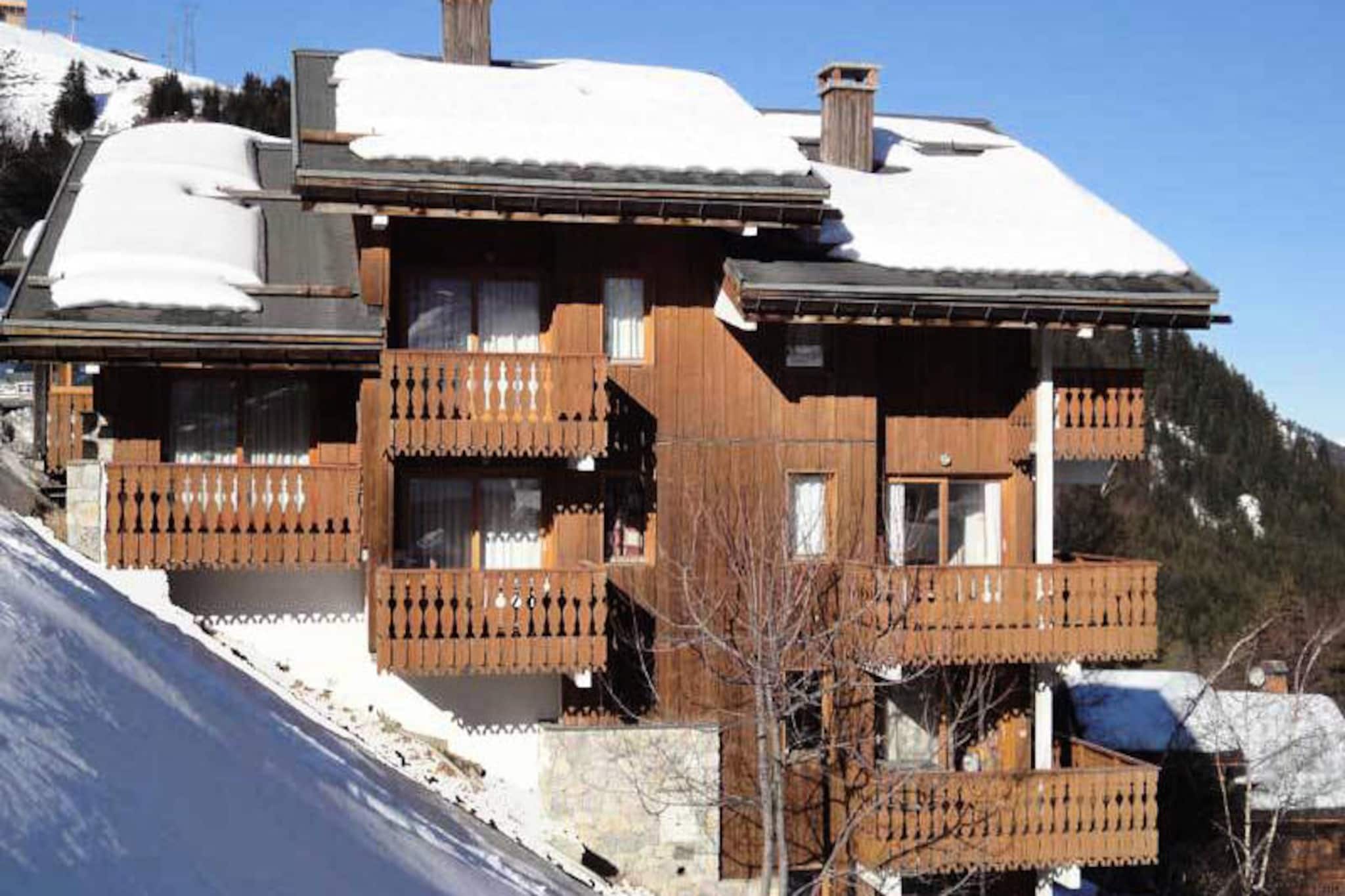 In the heart of the enchanting Méribel Valley, this charming duplex apartment offers a delightful alpine retreat for those seeking both adventure and relaxation. Situated in the Antarès residence, just 350 meters from the slopes, it provides easy access to the breathtaking ski terrain of the Three Valleys, the largest interconnected ski area in the world. With its south-facing balcony, you’ll wake up to stunning mountain views and the crisp, invigorating air of the French Alps.
Designed for comfort and convenience, this 4-room duplex accommodates up to six guests. The living area features two cozy sofas, one of which converts into a bed, creating a warm and inviting space to unwind after a day on the slopes. The open-plan kitchen is fully equipped with modern appliances, including a Nespresso machine and dishwasher, making meal preparation a breeze. The bedrooms are thoughtfully arranged, with two single beds on the main floor and two additional bedrooms upstairs, one with a double bed and the other with twin beds under skylights, perfect for a restful night’s sleep.
The residence is ideally located between the two main shopping centers, Le Hameau and Le Centre, both easily accessible via a nearby chairlift or stairs. From the property, a short walk leads you to the green run that connects to the main ski lift departure point, ensuring seamless access to the slopes. The Chalets cable car, operating from early morning until late evening, provides free transport to the Hameau and Laitelet districts, adding to the convenience of your stay.
Whether you’re here to carve through pristine snow, explore charming alpine villages, or simply relax in the serene mountain setting, this Méribel apartment is your gateway to unforgettable moments in the heart of the French Alps.
