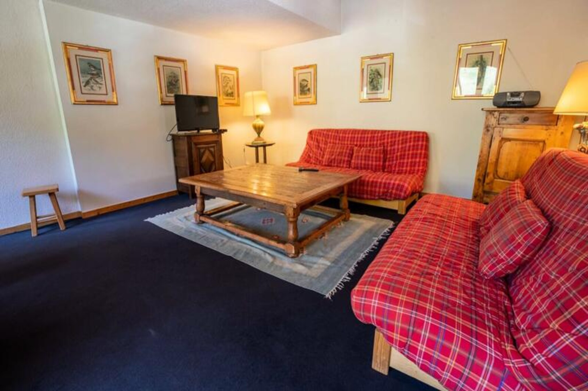 In the heart of Méribel Mottaret, where the charm of the Alps meets unparalleled convenience, this triplex apartment offers a luxurious retreat for your mountain escape. Imagine waking up to the crisp alpine air and stepping out onto one of four south-facing terraces to take in breathtaking views of the slopes and the surrounding ski area. Whether you're here for the thrill of skiing or the serenity of the mountains, this spacious 130m² apartment is perfectly positioned to make your stay unforgettable. 

The apartment boasts a bright and inviting upper floor with a large living room featuring two comfortable sofas and a high-ceilinged dining area, perfect for gathering after a day on the slopes. The fully equipped kitchen opens onto the dining space, making it easy to prepare meals while staying connected with your group. On the lower floor, you'll find three well-appointed bedrooms: one with a queen-size bed, another with a double bed, a single bed, and a pull-out single bed, and a third with a double bed. Two bathrooms with bathtubs and two separate toilets ensure comfort and privacy for all guests.

Located just 100 meters from the slopes, you can ski out with ease and enjoy direct access to the world-renowned 3 Valleys ski area. A mini-market and restaurants are just steps away, and the free resort shuttle stops 30 meters from your door, connecting you to all parts of Méribel. For summer visitors, the picturesque Lac de Tueda is a short 5-minute walk, offering scenic trails and tranquil beauty.

With Wi-Fi, a TV, a dishwasher, and a private garage, this apartment combines modern amenities with alpine charm. Optional services like ski pass delivery, equipment rental discounts, and private chef arrangements add a touch of luxury to your stay. Whether you're here for adventure or relaxation, this Méribel Mottaret retreat promises memories to last a lifetime.