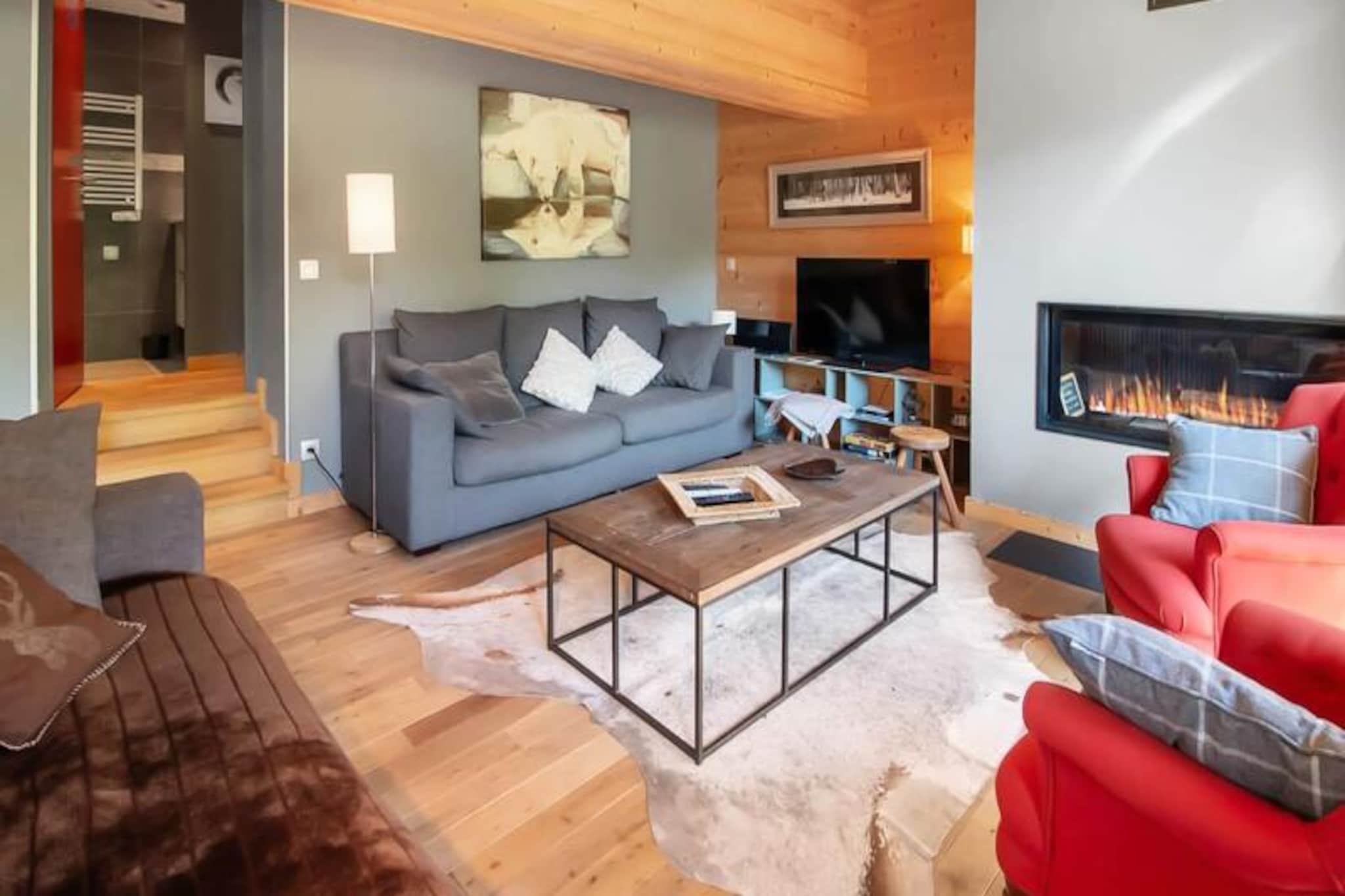 Awaken to the crisp alpine air and the golden glow of the French Alps in this stunning south-facing apartment, Chalet de L'Ours Premier. Nestled in the sought-after Morel area of Méribel, this premium retreat combines modern comfort with authentic mountain charm. Just 350 meters from the Morel chairlift, it offers seamless access to the world-renowned 3 Valleys ski area, making it a haven for winter sports enthusiasts and nature lovers alike. With its large bay windows, the apartment bathes in natural light, offering breathtaking views of the surrounding peaks. 
 
 Step inside to discover a thoughtfully designed space that comfortably accommodates up to six guests. The apartment features a cozy living room with plush sofas, a crackling fireplace, and a spacious dining area perfect for sharing meals and stories after a day on the slopes. The open-plan kitchen is fully equipped with modern appliances, including a dishwasher, oven, microwave, and coffee machines, ensuring all the comforts of home. The sleeping arrangements include a double bedroom, a second bedroom with bunk beds, and a second double bedroom, complemented by two well-appointed bathrooms for added convenience. Wi-Fi and a private parking space complete the package, ensuring a hassle-free stay. 
 
 Beyond the apartment, the Morel area offers a delightful blend of tranquility and convenience. A short stroll brings you to charming restaurants like Alti 16 and Tsaretta Spice, a Sherpa supermarket for essentials, and a ski shop for all your gear needs. The nearby Hulotte slope allows for an easy return to the Morel chairlift, while free shuttle services connect you effortlessly to the rest of Méribel and its vibrant après-ski scene. 
 
 Whether you're here to carve through pristine snow, savor the local cuisine, or simply unwind in the serene mountain setting, Chalet de L'Ours Premier promises an unforgettable alpine escape. Let the magic of Méribel captivate you, and create memories to last a lifetime.