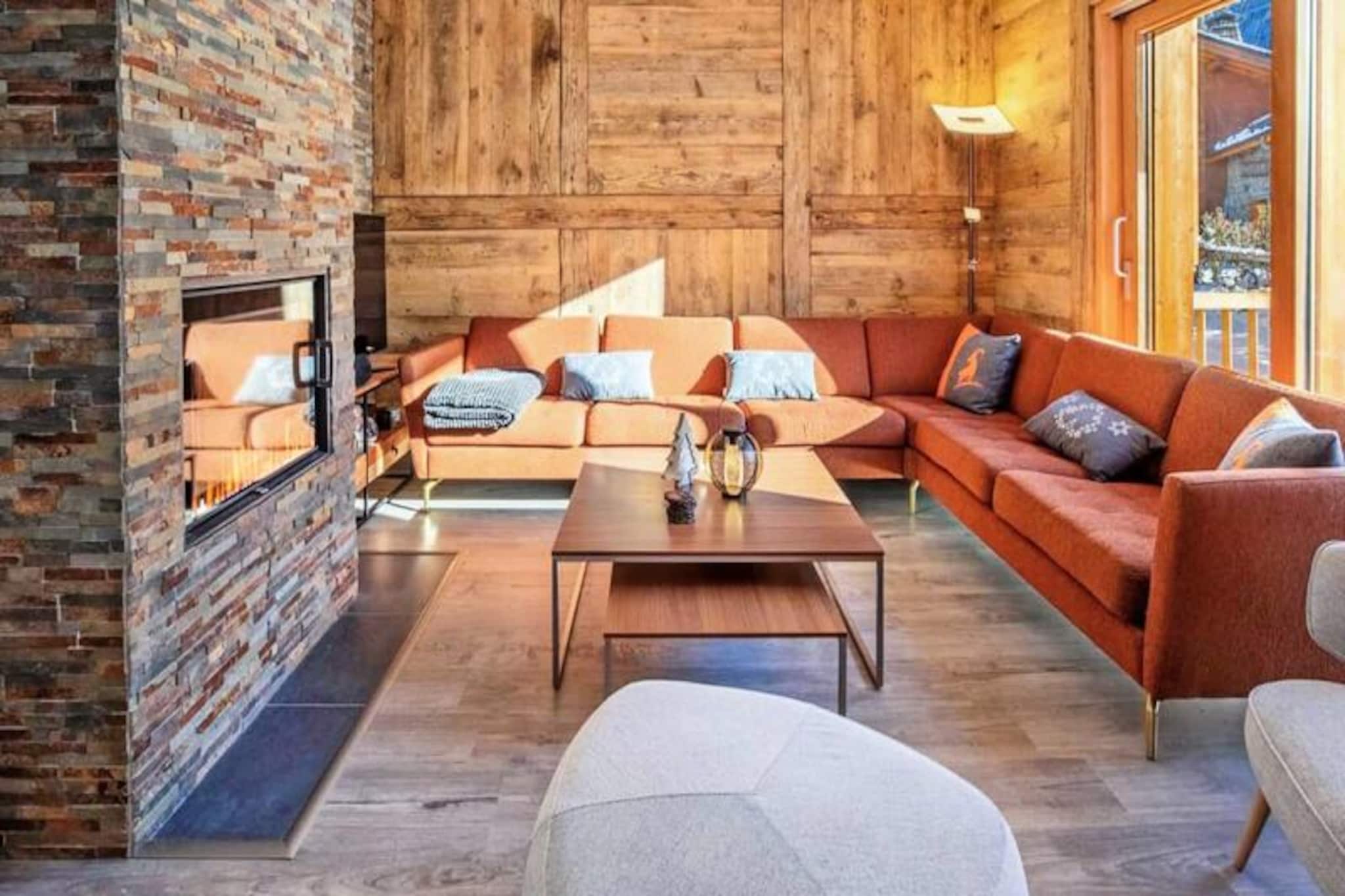 In the heart of the charming village of Les Allues, Chalet de l'Olympe A2 invites you to experience the perfect alpine getaway. Surrounded by the breathtaking beauty of the French Alps, this newly built chalet offers a harmonious blend of modern comfort and traditional mountain charm. Whether you're seeking thrilling days on the slopes or cozy evenings by the fire, this is the ideal retreat for your next ski holiday. 
 
 Spread across two spacious levels, the chalet is thoughtfully designed to accommodate up to ten guests. The ground floor boasts a large and inviting living area, complete with a fireplace, plush seating, and a Bluetooth speaker to set the mood. The open-plan kitchen is a culinary dream, equipped with everything from a Thermomix to a raclette grill, perfect for preparing hearty mountain meals. Upstairs, you'll find four beautifully appointed bedrooms, including two with en-suite bathrooms, ensuring privacy and comfort for all. A dormitory-style room adds a playful touch, making it ideal for families or groups of friends. Modern amenities such as Wi-Fi, a laundry room, and a ski locker with a boot dryer ensure a seamless stay.
 
 Located just 500 meters from the Olympe gondola lift, the chalet provides easy access to the world-renowned Méribel ski area. The historic village of Les Allues offers a delightful array of local amenities, including a mini-market, ski shop, and restaurants, all within walking distance. For added convenience, a free shuttle bus stops just 400 meters away, connecting you to the wider 3 Valleys ski domain.
 
 Whether you're exploring snowy trails with the provided snowshoes, indulging in a private chef's culinary creations, or simply soaking in the serene mountain atmosphere, Chalet de l'Olympe A2 promises an unforgettable alpine escape. Let the CVR team take care of every detail, from ski passes to massages, so you can focus on creating lasting memories in this enchanting winter wonderland.